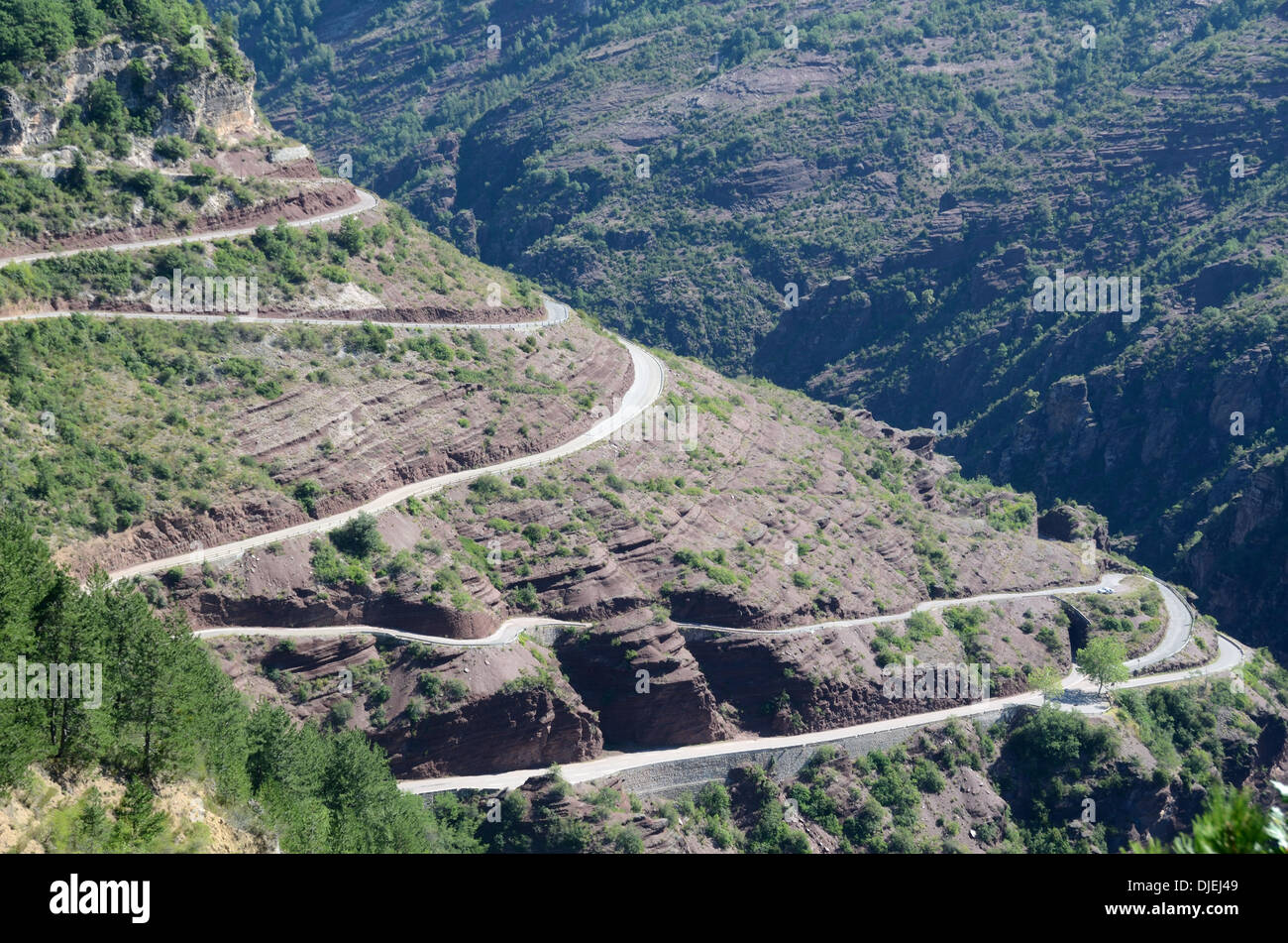 Hairpin Bends on Narrow Road or Zigzagging Mountain Road Daluis Gorge Alpes-Maritimes France Stock Photo