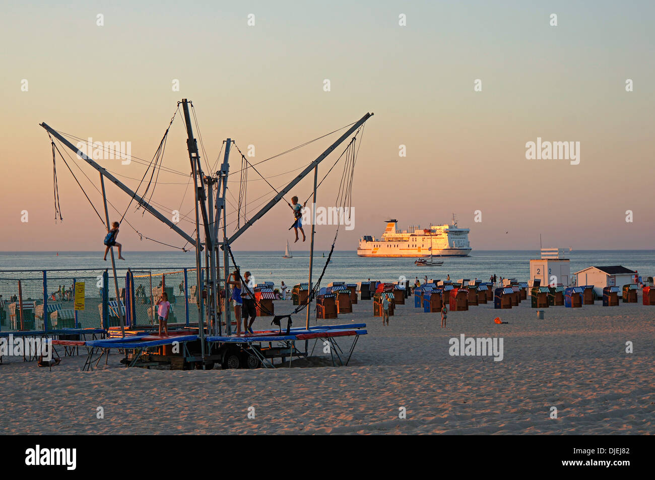 Beach of Warnemuende, Kids playing, Baltic Sea, Ferry, Germany Stock Photo
