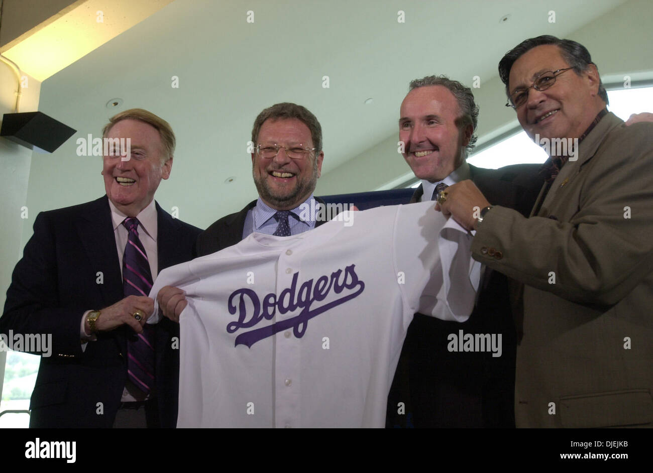 Nov 22, 2004; Los Angeles, CA, USA; Los Angeles Dodgers owner FRANK McCOURT (2nd R) introduces