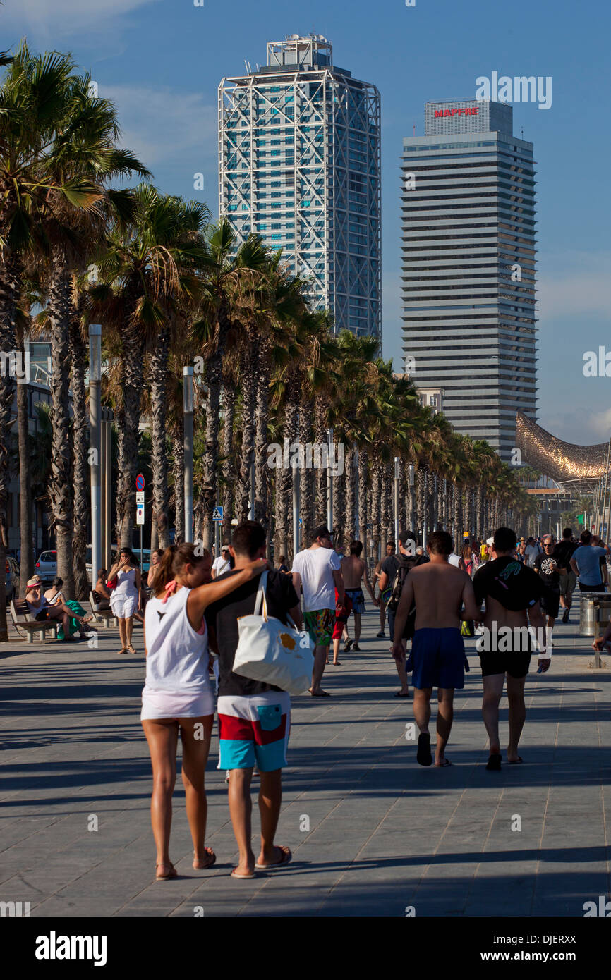 People strolling on the promenade, Barceloneta beach, Barcelona Stock Photo