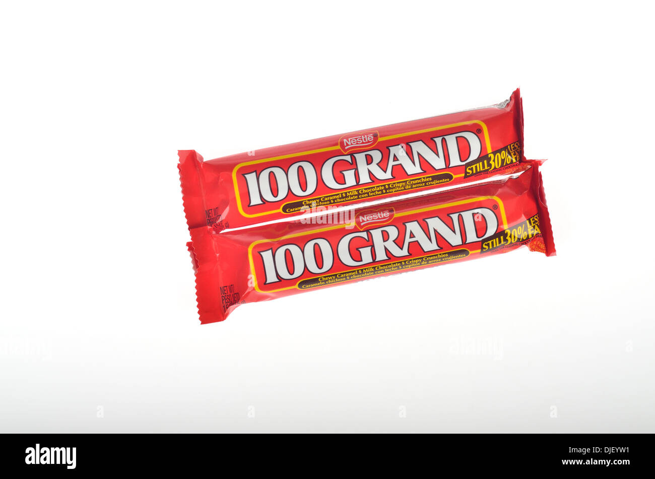 2 Nestle 100 Grand Candy Bars in wrappers on white background, cutout USA Stock Photo