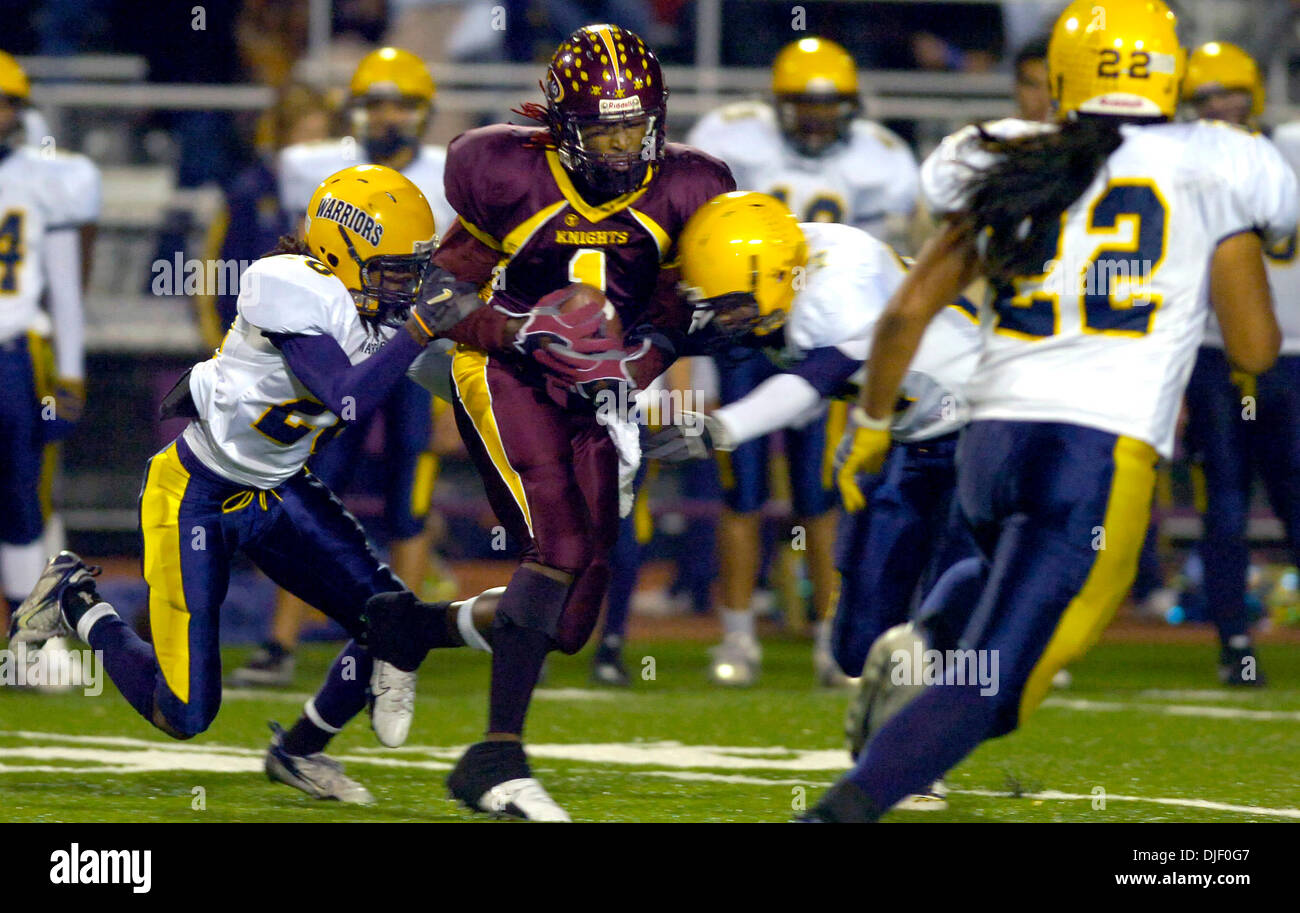 Knights wide receiver Diante Jackson (1) is corralled by the Ygnacio