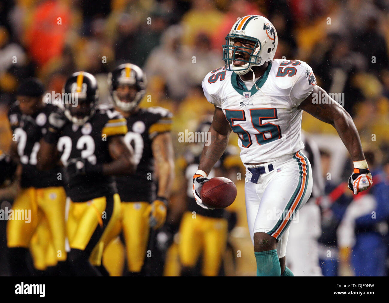 Miami Dolphins linebacker Joey Porter (55) stands on sideline during the  first quarter of a football game Sunday, Oct. 7, 2007 in Houston. (AP  Photo/David J. Phillip Stock Photo - Alamy