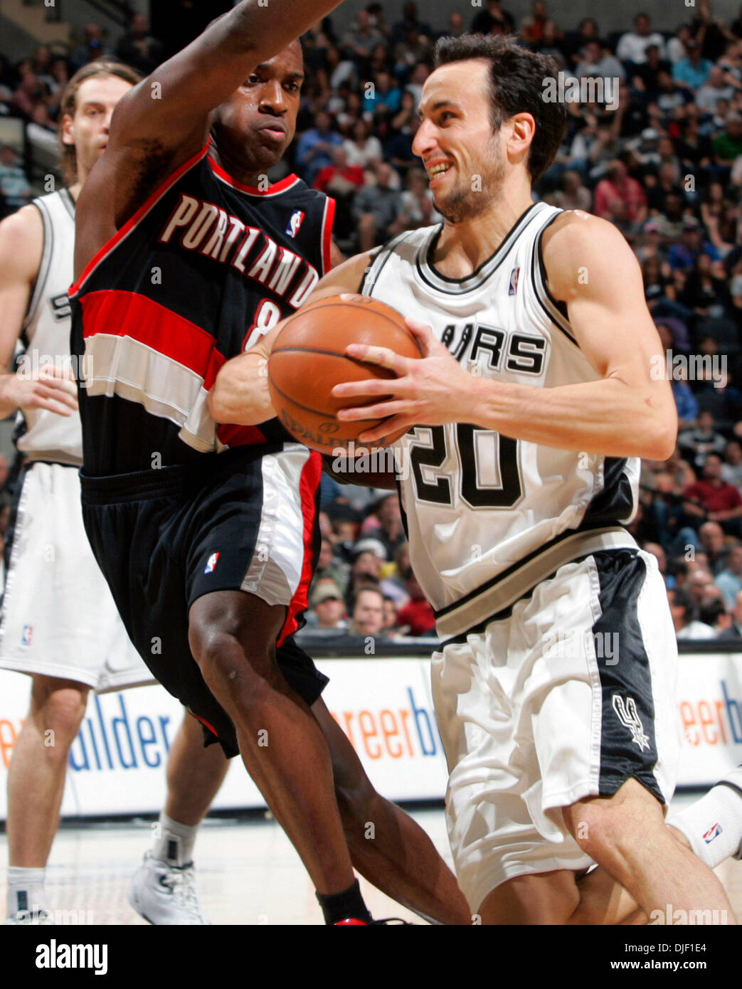 Dec 02, 2007 - San Antonio, Texas, USA - The San Antonio Spurs' MANU GINOBILI drives Sunday afternoon Dec. 2, 2007 at the AT&T Center in San Antonio around the Portland Trail Blazers' MARTELL WEBSTER during the second half of the Spurs' 100-97 win over the Blazers. (Credit Image: © William Luther/San Antonio Express-News/ZUMA Press) RESTRICTIONS: * San Antonio, Seattle Newspapers a Stock Photo