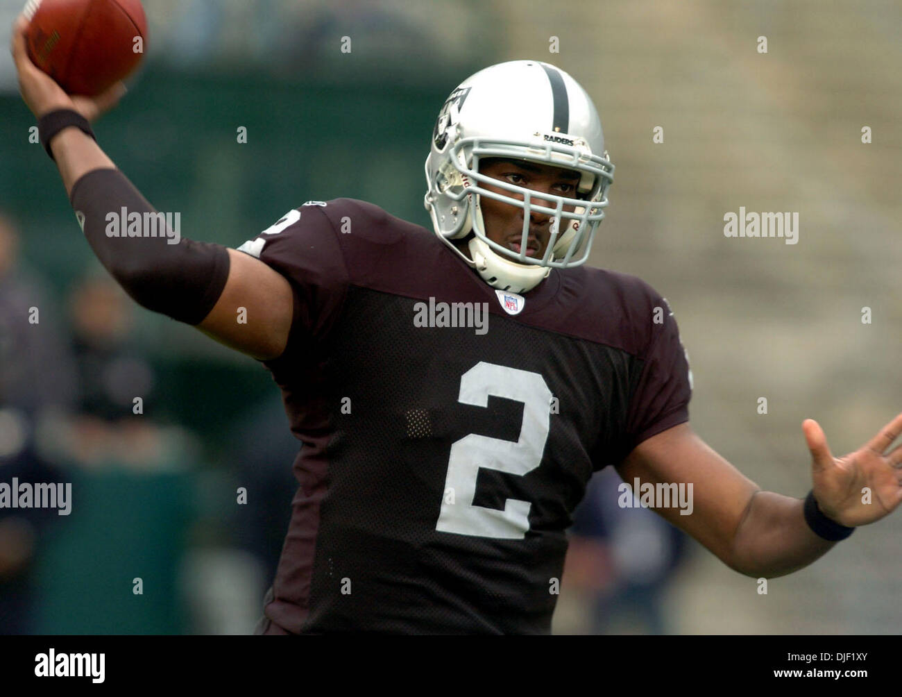 The Raiders' JaMarcus Russell throws his first NFL pass against the ...