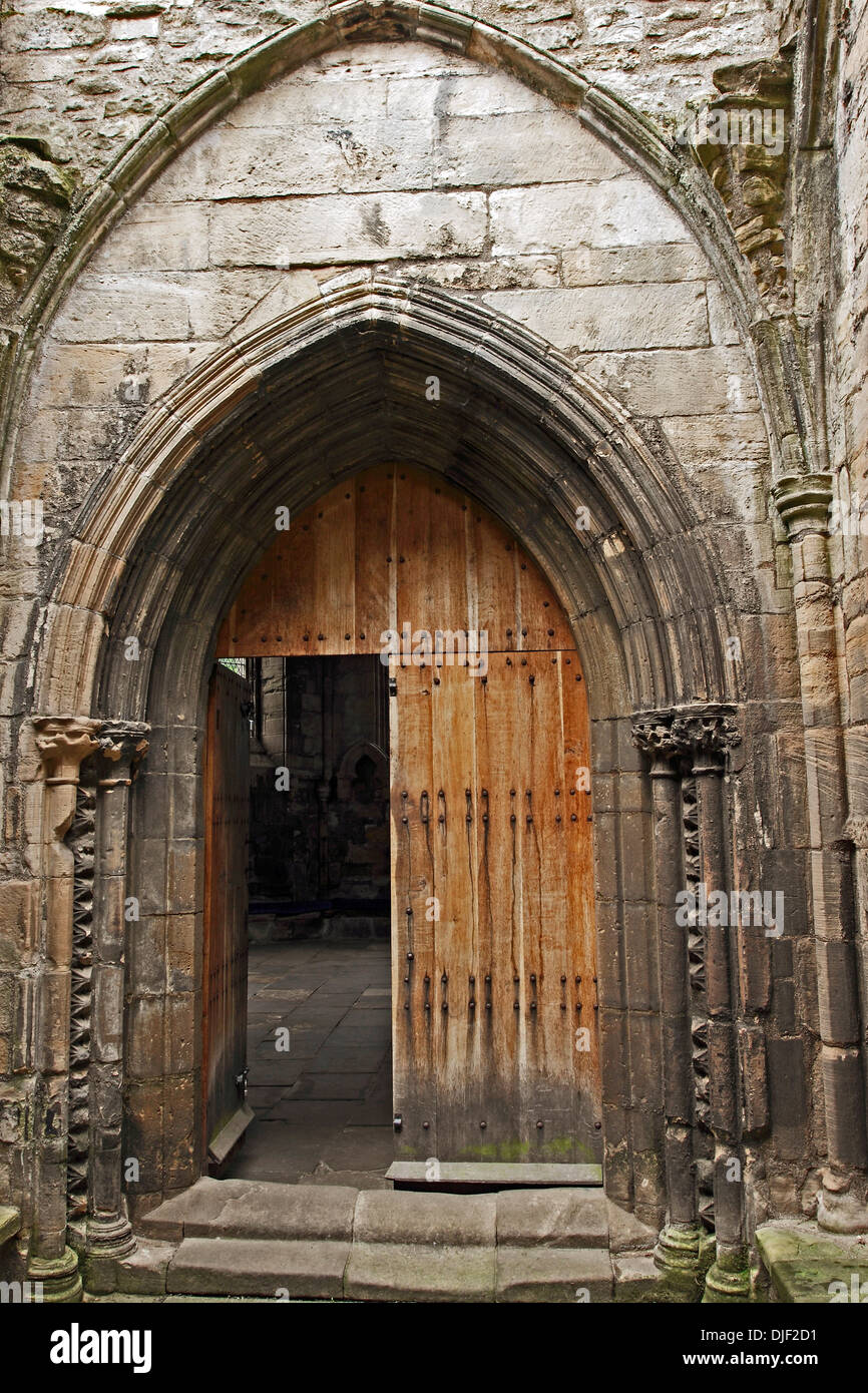 The ancient door to the Chapter House within the ruins of the medieval Cathedral at Elgin in Morayshire, Scotland. Stock Photo