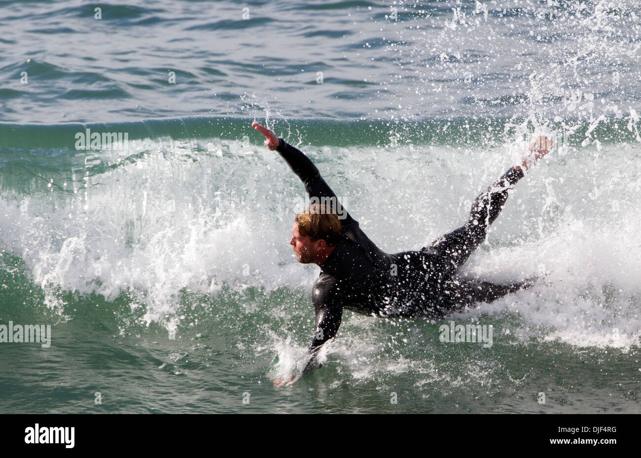 Surfer Wipe Out Stock Photo