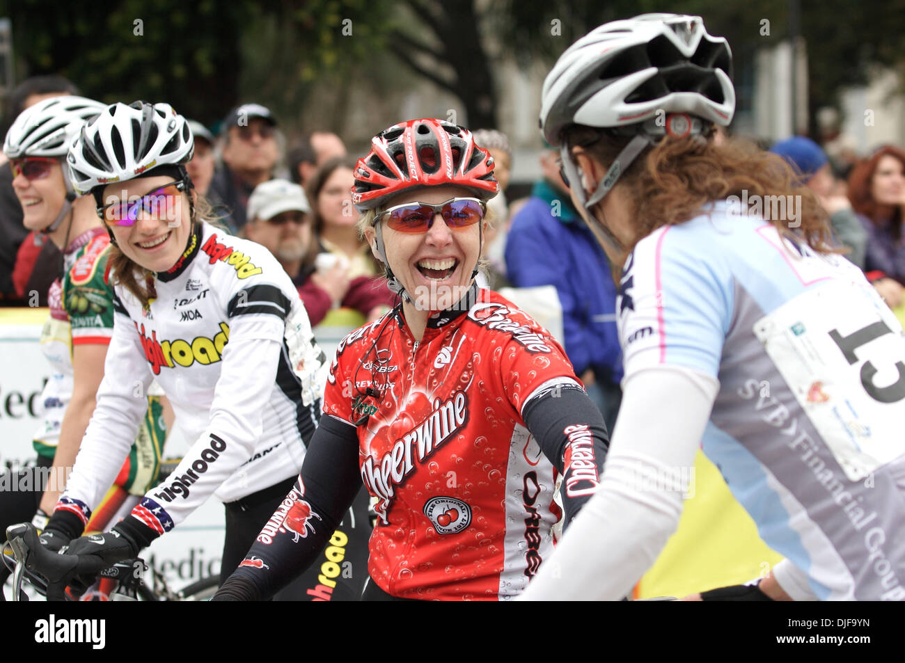 Feb 18, 2008 - Santa Rosa, California, USA - LAURA VAN GILDER of Cheerwine greets BROOKE MILLER as she approaches the starting line of the women's criterium at the 2008 Amgen Tour of California before the men arrive in town, finising their first stage of the Amgen Tour of California. Miller went on to win the first ever women's criterium. (Credit Image: © Kate Karwan Burgess/ZUMA P Stock Photo