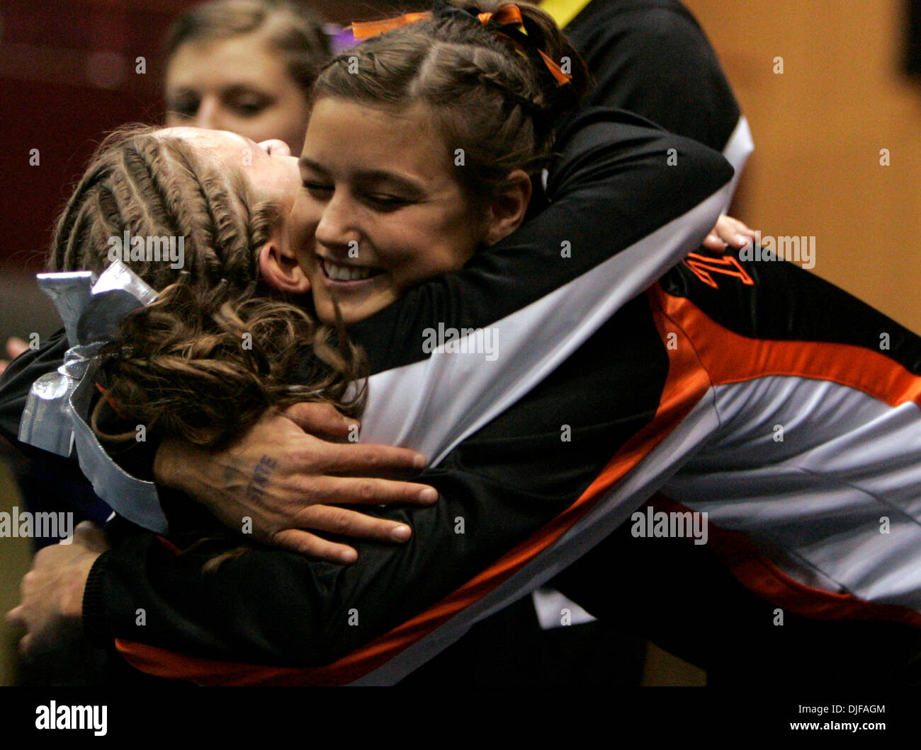 Feb 23, 2008 - St. Paul, MN - Minnesota, USA - United States - Roseville High's ANNA GLEASON, winner of the  All-Around competition, left, gets a hug from runner-up ALISE POST of St. Cloud Tech during the award ceremony for the Individual and All Around 2008 state AA gymnastics championships at the Roy Wilkins Auditorium in St. Paul.  (Credit Image: © David Joles/Minneapolis Star T Stock Photo