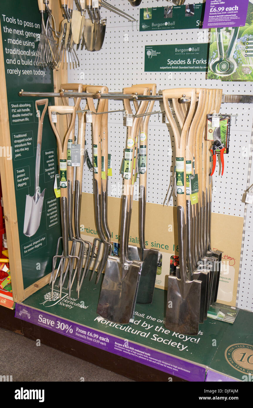 Garden forks spades display garden center England Stock Photo