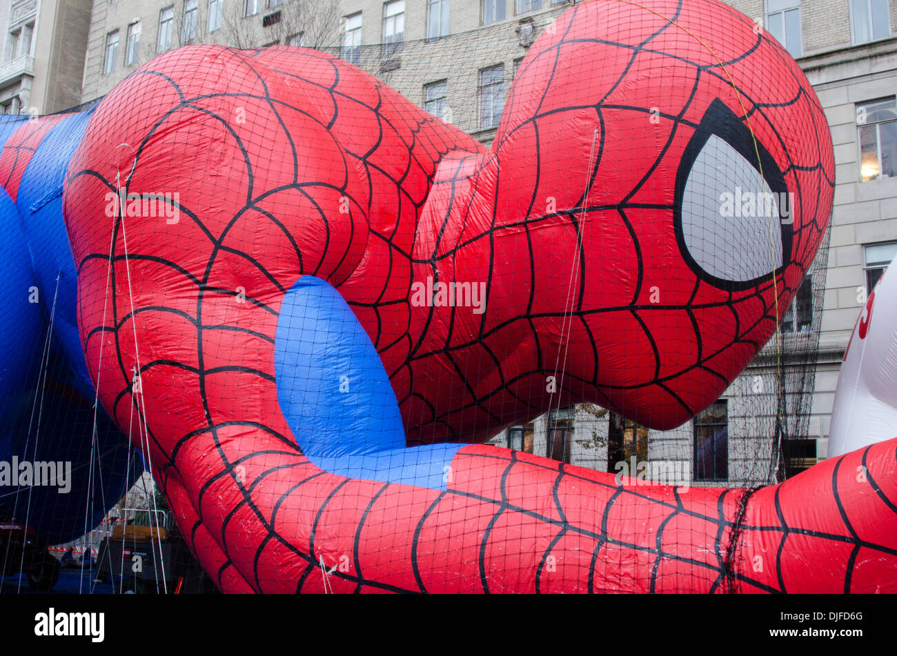 NEW YORK, NY, USA, Nov. 27, 2013. 'Spiderman' balloon being inflated on the day before the 87th Annual MacyÕs Thanksgiving Day Parade. Credit:  Jennifer Booher/Alamy Live News Stock Photo