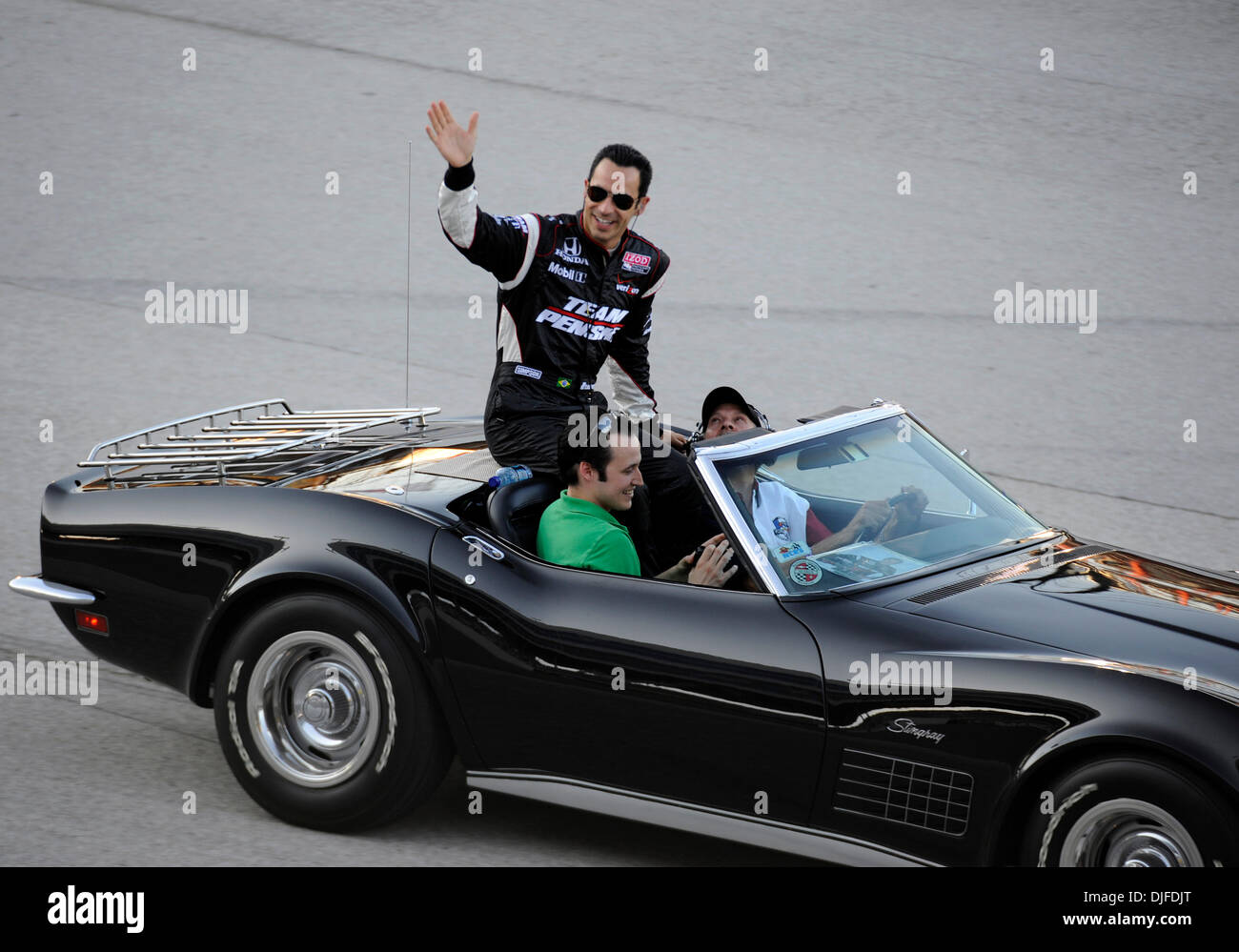Helio Castroneves waves to the crowd before the IZOD IndyCar Series Firestone 550k at Texas Motor Speedway in Fort Worth, Texas.  Ryan Briscoe of Team Penske won the IZOD IndyCar Series 550k (Credit Image: © Albert Pena/Southcreek Global/ZUMApress.com) Stock Photo