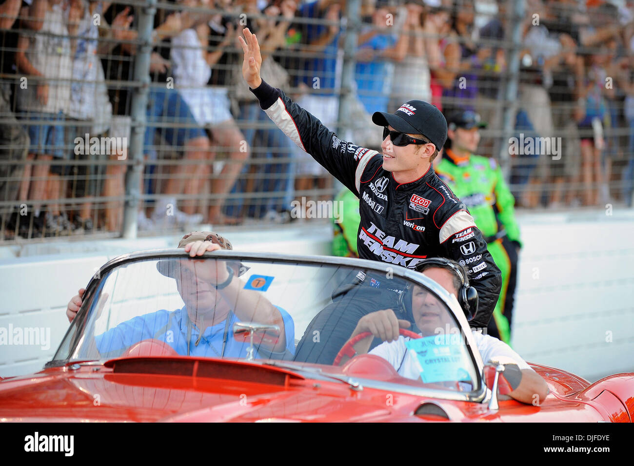 Australian driver Ryan Briscoe (6) waves to his fans at the Firestone