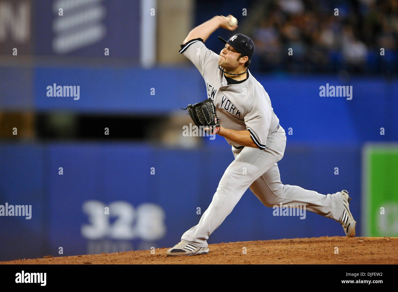 June 06, 2010 - Toronto, Ontario, Canada - 06 June 2010: New York Yankees relief pitcher Joba Chamberlain (62) is seen pitching during Sunday's baseball game, where the New York Yankees defeated the Toronto Blue Jays 4-3 at the Rogers Centre in Toronto, Ontario. (Credit Image: © Adrian Gauthier/Southcreek Global/ZUMApress.com) Stock Photo