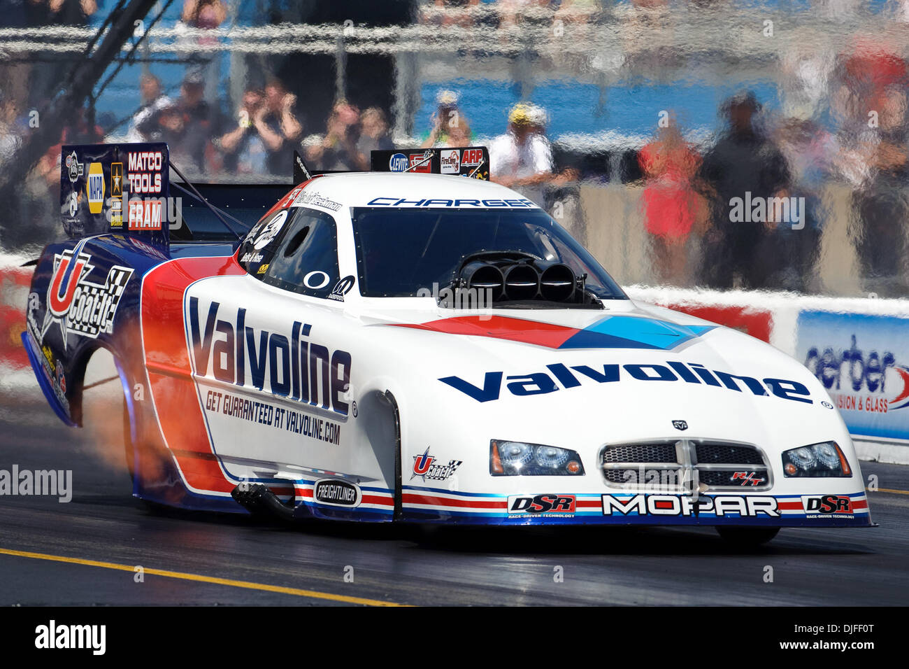 Jack Beckman heads to a 1st round win in his Valvoline / MTS Charger