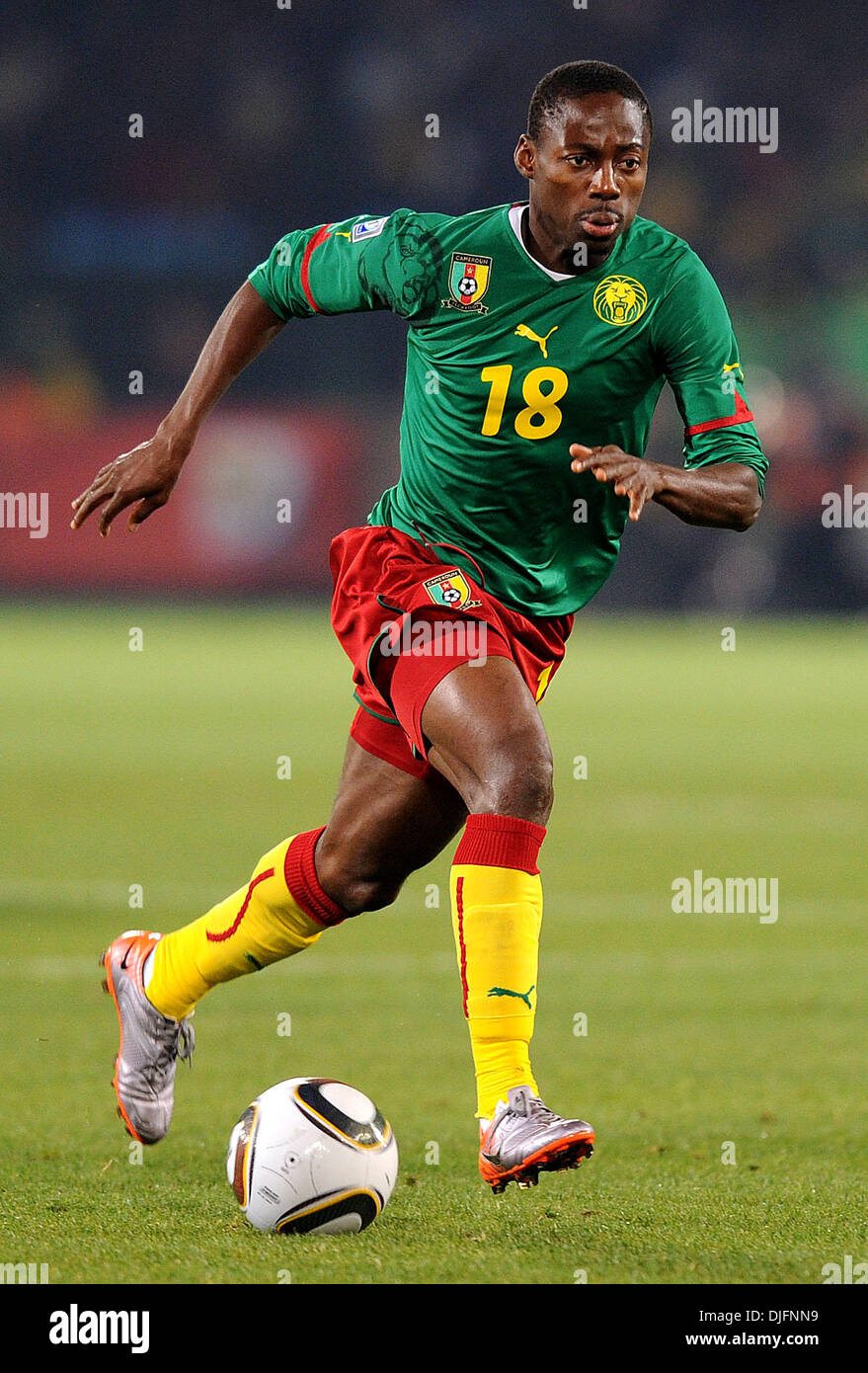 June 19, 2010 - Pretoria, South Africa - Eyong Enoh of Cameroon in action during the FIFA World Cup 2010 soccer match between Cameroon and Denmark at Loftus Versfeld Stadium on June 18, 2010 in Pretoria, South Africa. (Credit Image: © Luca Ghidoni/ZUMApress.com) Stock Photo