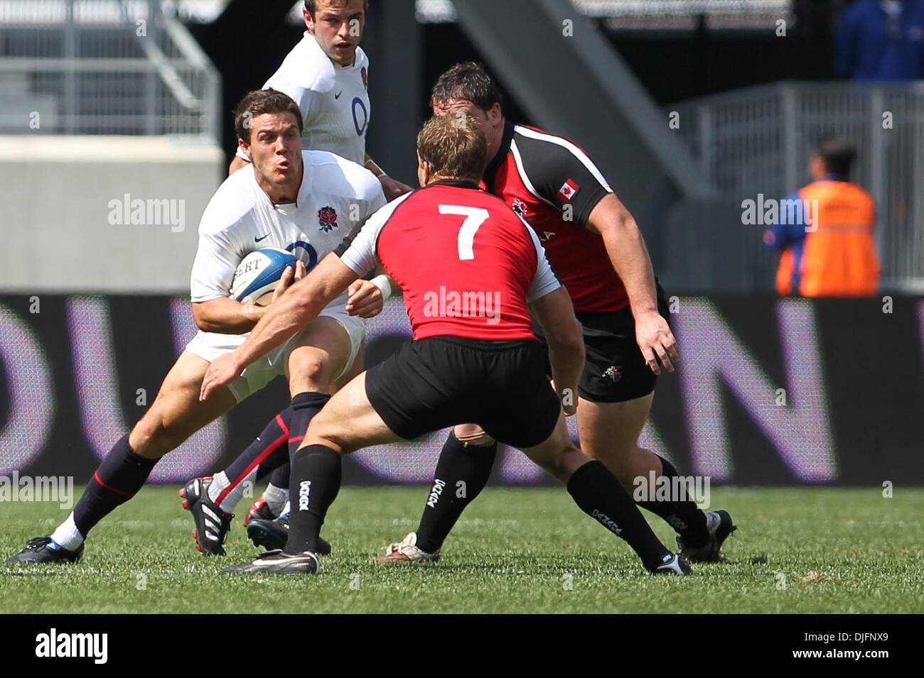 Canada Flanker Adam Kleeberger (7) blocks. England Saxon's defeated