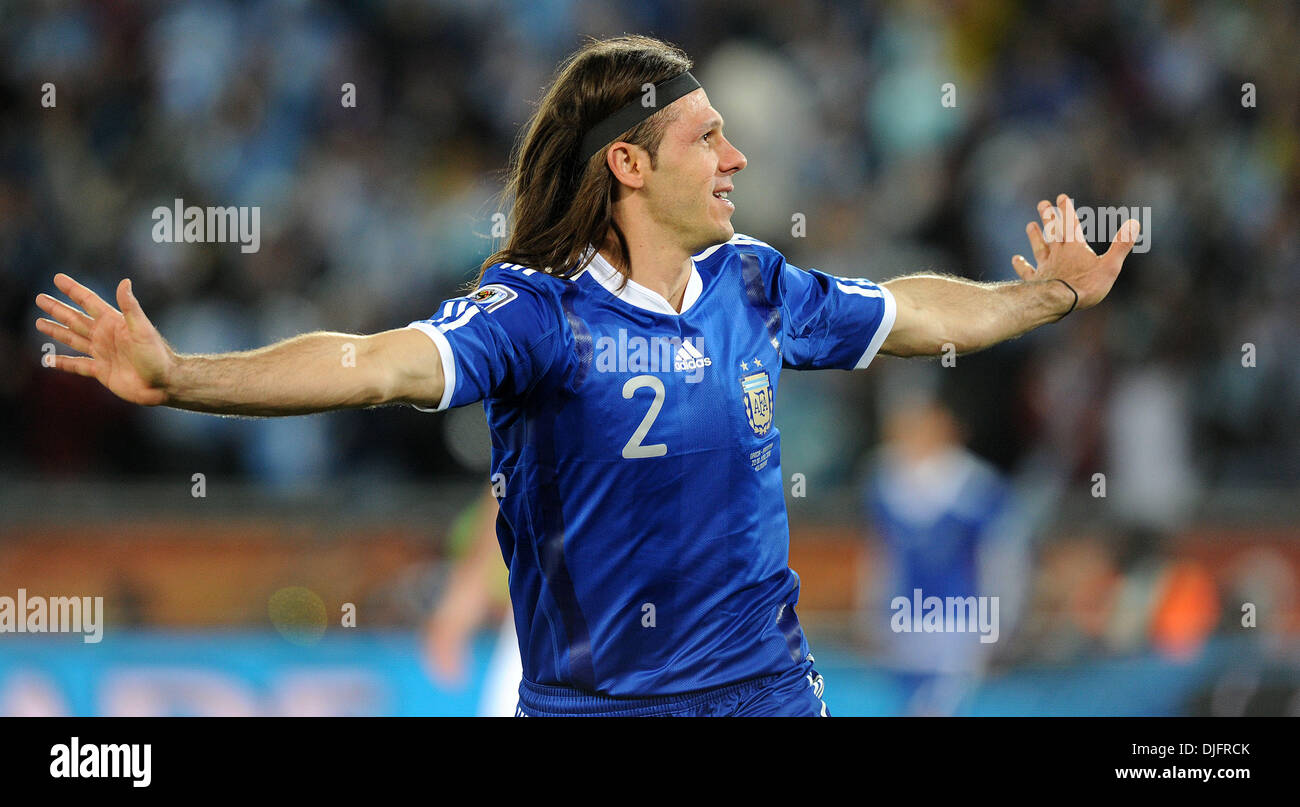 June 22, 2010 - Polokwane, South Africa - Martin Demichelis of Argentina celebrates after scoring during the 2010 FIFA World Cup soccer match between Greece and Argentina at Peter Mokaba Stadium on June 22, 2010 in Polokwane, South Africa. (Credit Image: © Luca Ghidoni/ZUMApress.com) Stock Photo