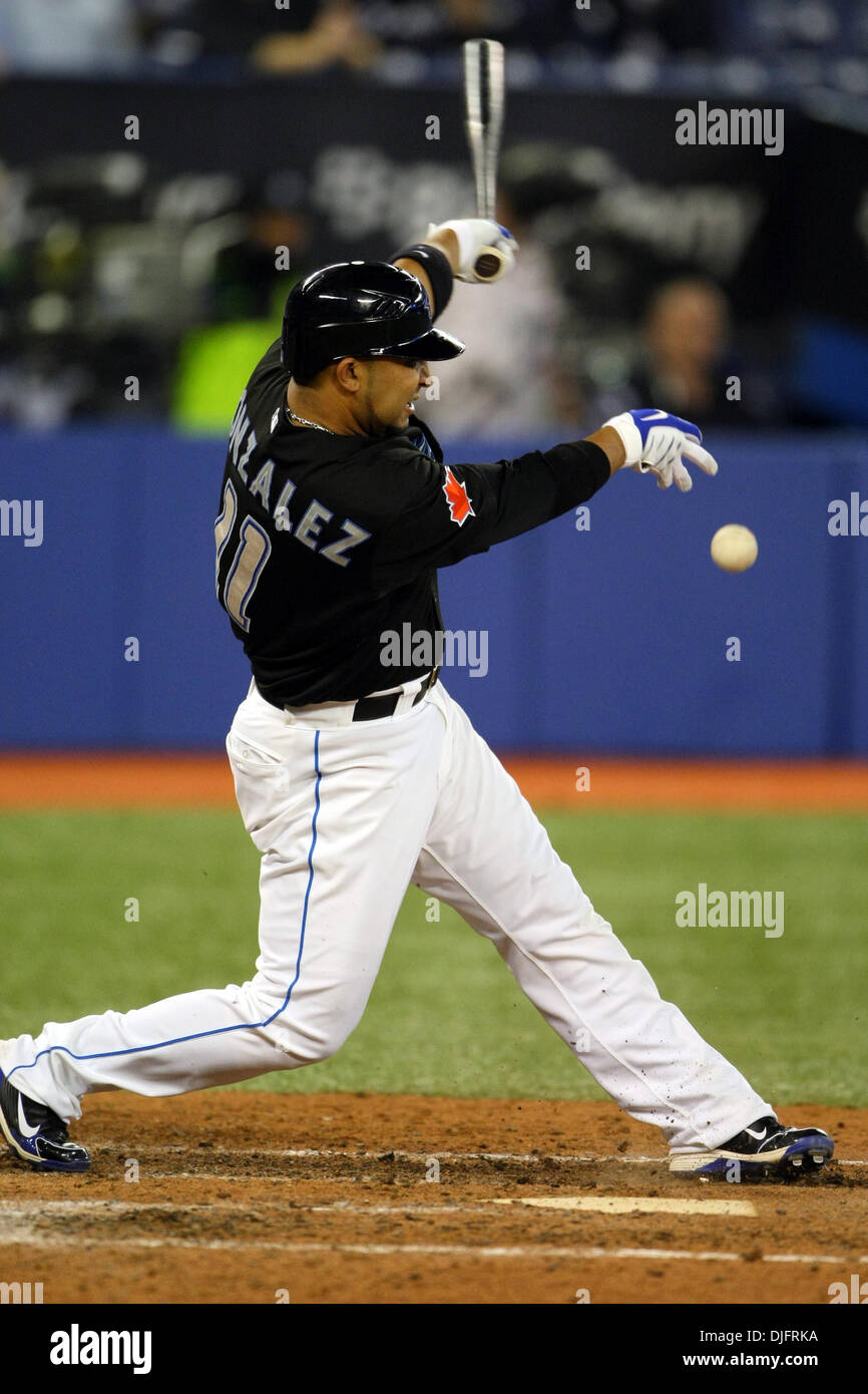 Toronto Blue Jays shortstop Alex Gonzalez (11) fouls to left field