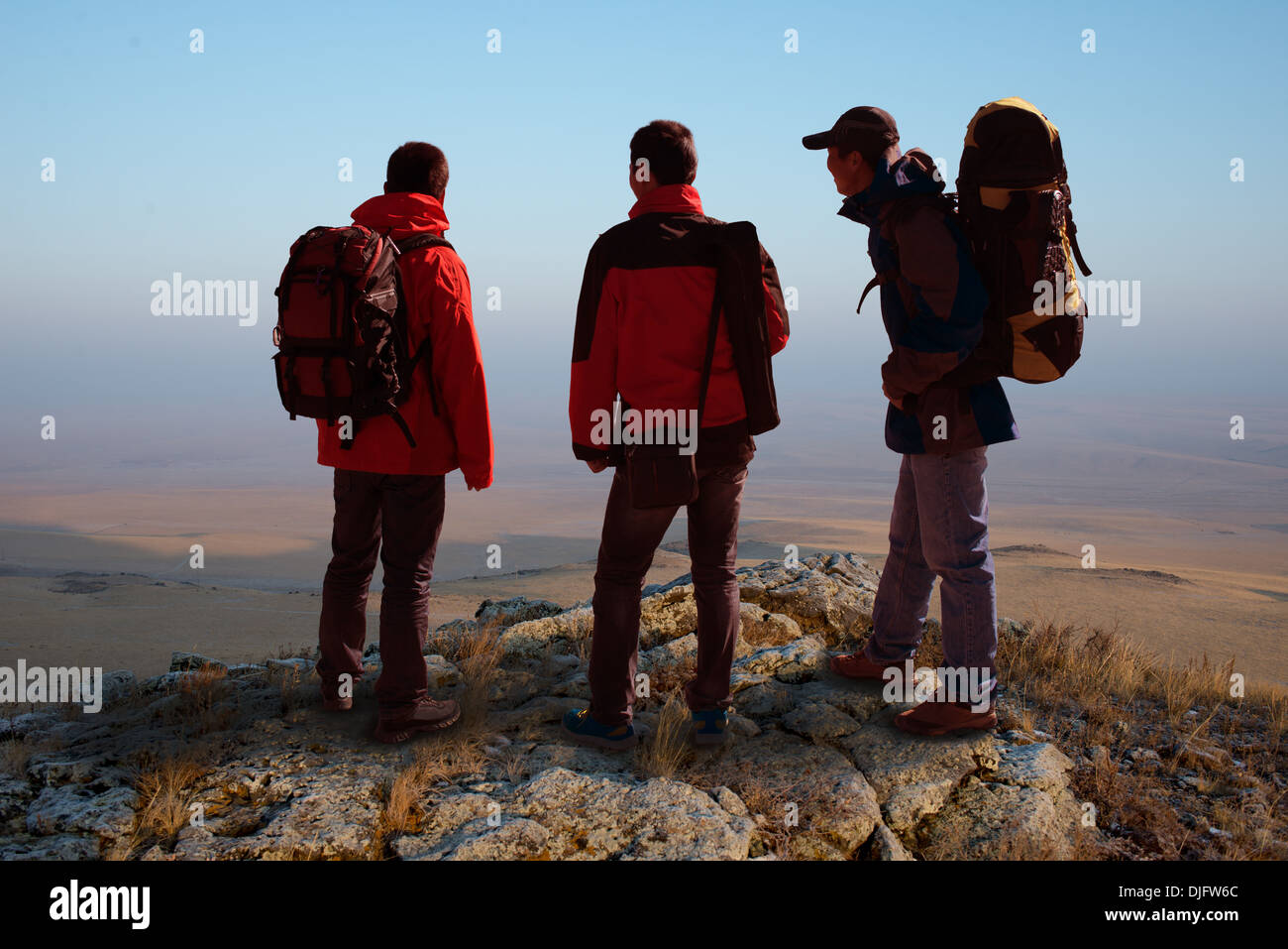 Trekking in mountains, greet the morning sun Stock Photo Alamy