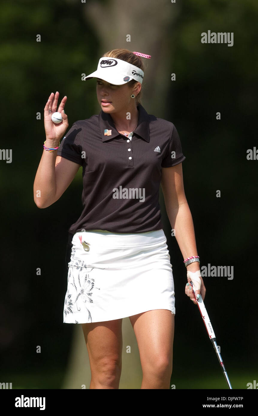 Golfer Paula Creamer reacts to the gallery during the 2nd round of the