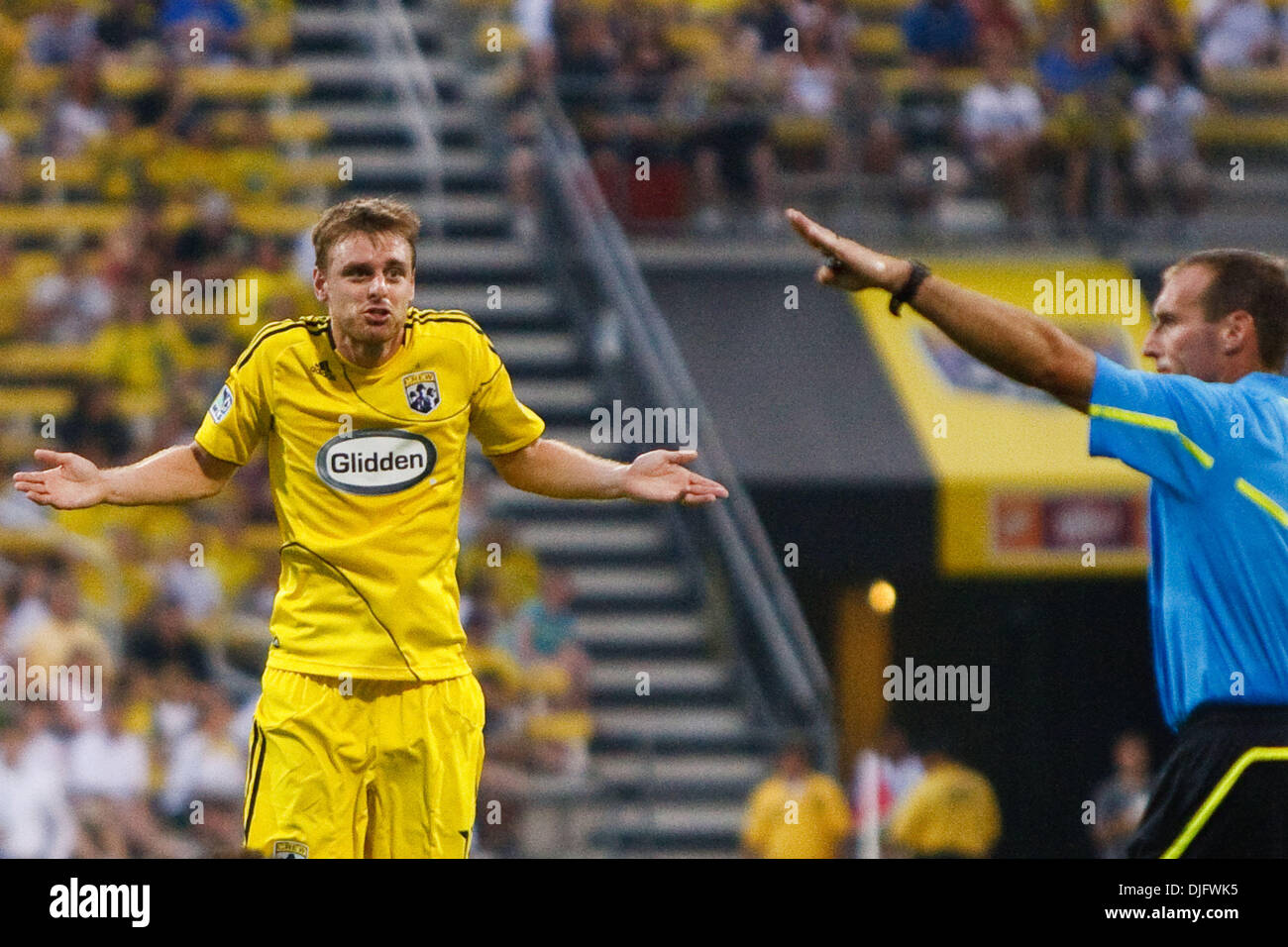 Crew midfielder Eddie Gaven (12) disagrees with referee Terry Vaughn's call during game action.  The Columbus Crew defeated the D.C. United 2-0 at Crew Stadium in Columbus, Ohio. (Credit Image: © Scott Grau/Southcreek Global/ZUMApress.com) Stock Photo