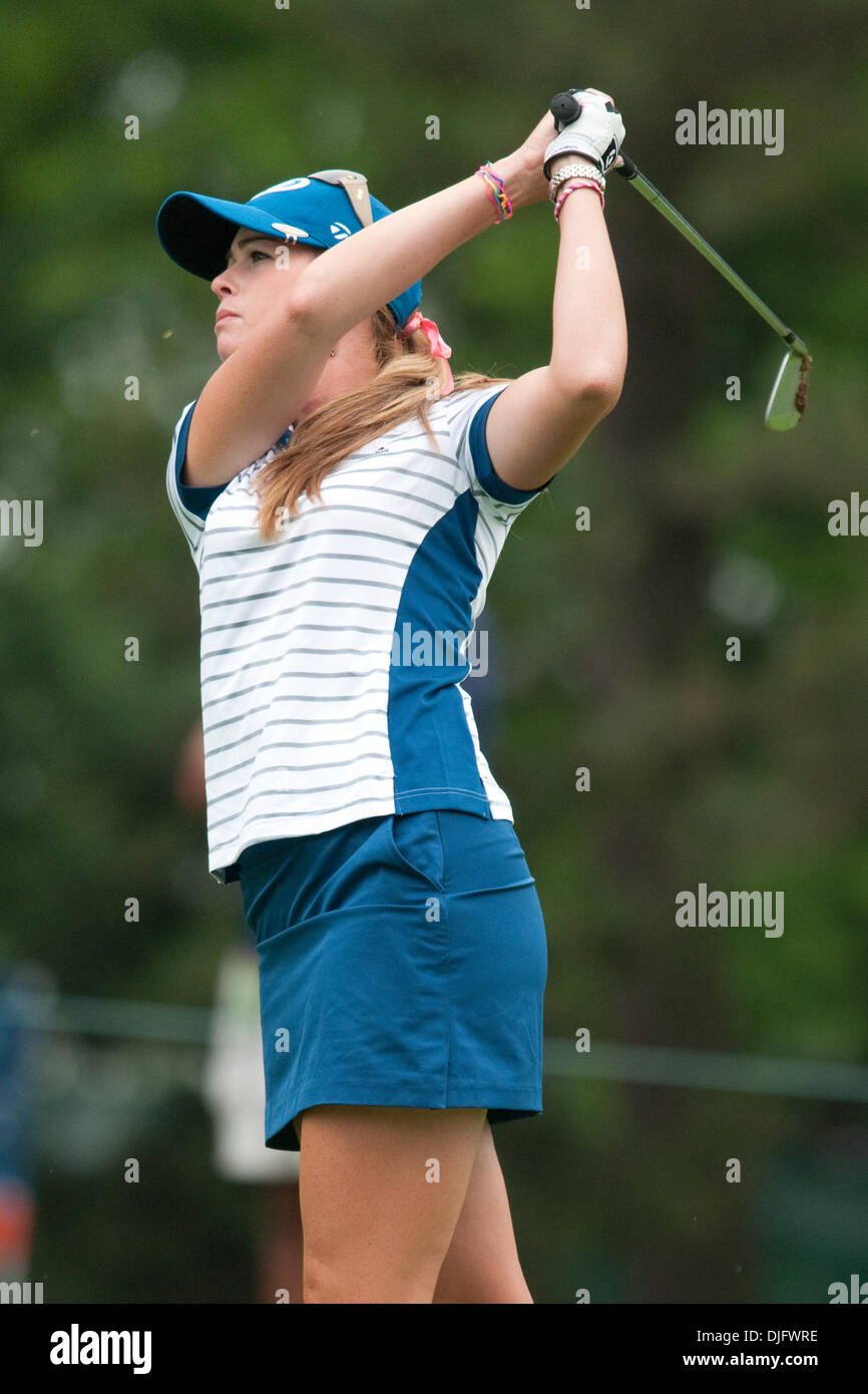 Golfer Paula Creamer hits a fairway shot at the 10th hole during the