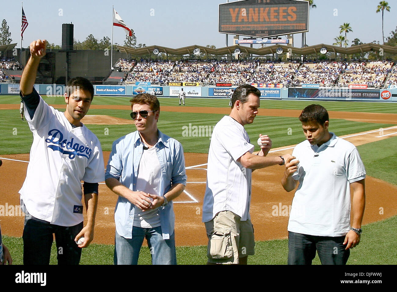 26 Jun  2010:  The cast of the hit HBO show Entourage, prepare to throw out the ceremonial first pitch prior to the start of the game between the New York Yankees and the Los Angels Dodgers.  From left to right, Adrian Grenier, Kevin Connolly, Kevin Dillon, Jerry Ferrara. (Credit Image: © Tony Leon/Southcreek Global/ZUMApress.com) Stock Photo