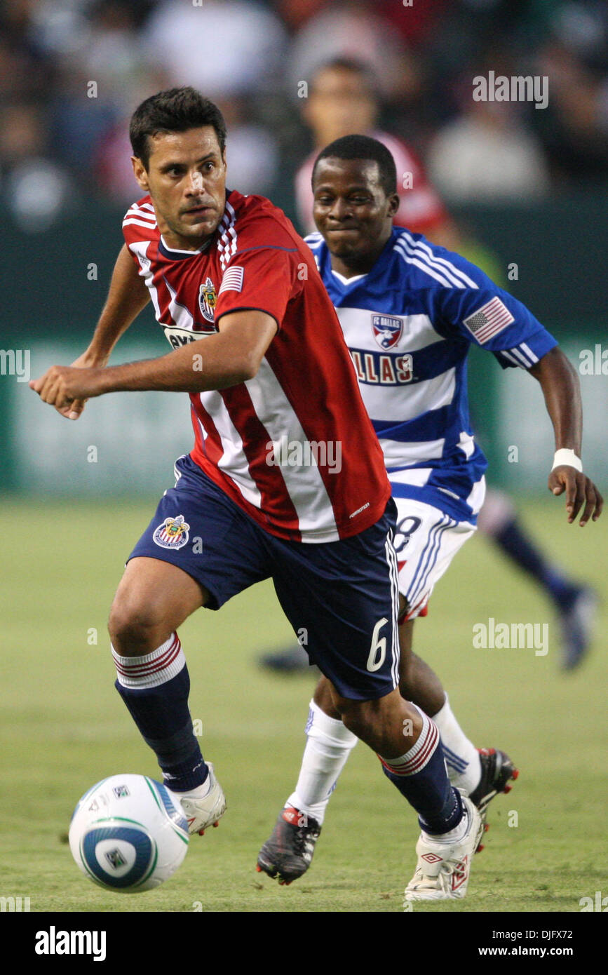 26 June 2010: Chivas USA D #6 Ante Jazic (L) dribbles away from FC Dallas M #18 Marvin Chavez (R) during the Chivas USA vs FC Dallas game at the Home Depot Center in Carson, California. FC Dallas went on to defeat Chivas USA with a final score of 2-1. Mandatory Credit: Brandon Parry / Southcreek Global (Credit Image: © Brandon Parry/Southcreek Global/ZUMApress.com) Stock Photo