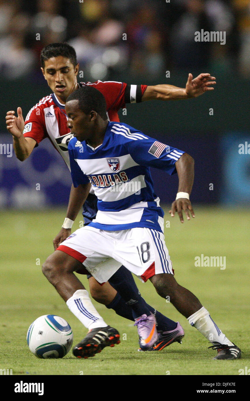 26 June 2010: FC Dallas M #18 Marvin Chavez (front) dribbles away from Chivas USA D #8 Mariano Trujillo (back) during the Chivas USA vs FC Dallas game at the Home Depot Center in Carson, California. FC Dallas went on to defeat Chivas USA with a final score of 2-1. Mandatory Credit: Brandon Parry / Southcreek Global (Credit Image: © Brandon Parry/Southcreek Global/ZUMApress.com) Stock Photo