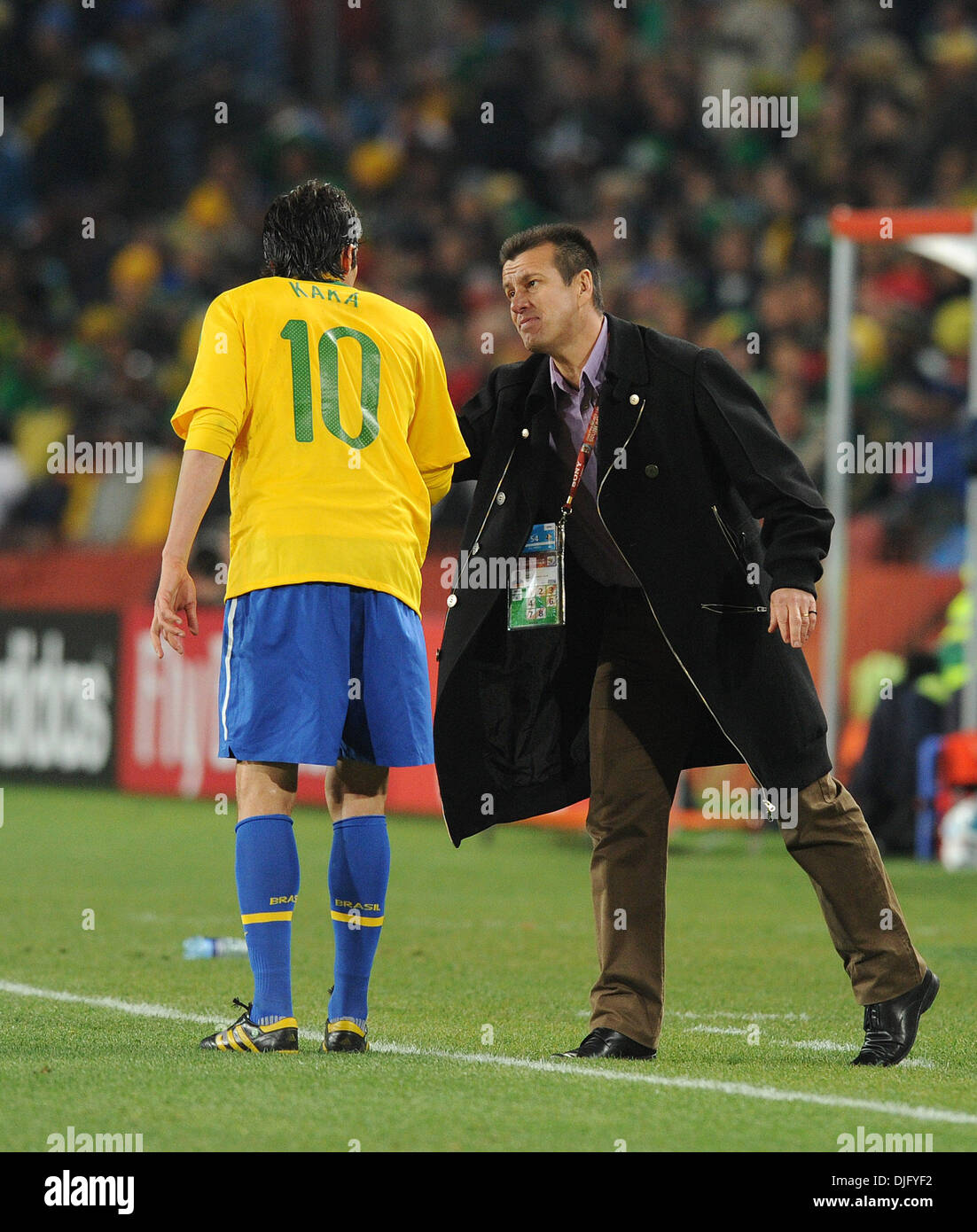 June 28, 2010 - Johannesburg, South Africa - Carlos Dunga, coach of Brazil speaks with Kaka during the 2010 FIFA World Cup soccer match between Brazil and Chile at Ellis Park Stadium on June 28, 2010 in Johannesburg, South Africa. (Credit Image: © Luca Ghidoni/ZUMApress.com) Stock Photo