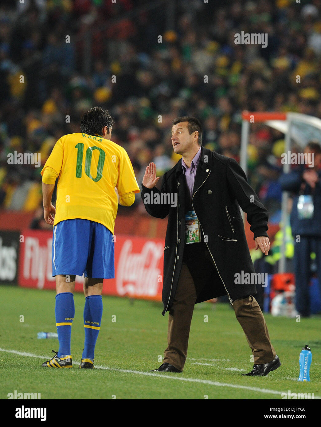 June 28, 2010 - Johannesburg, South Africa - Carlos Dunga, coach of Brazil talks to Kaka during the 2010 FIFA World Cup soccer match between Brazil and Chile at Ellis Park Stadium on June 28, 2010 in Johannesburg, South Africa. (Credit Image: © Luca Ghidoni/ZUMApress.com) Stock Photo