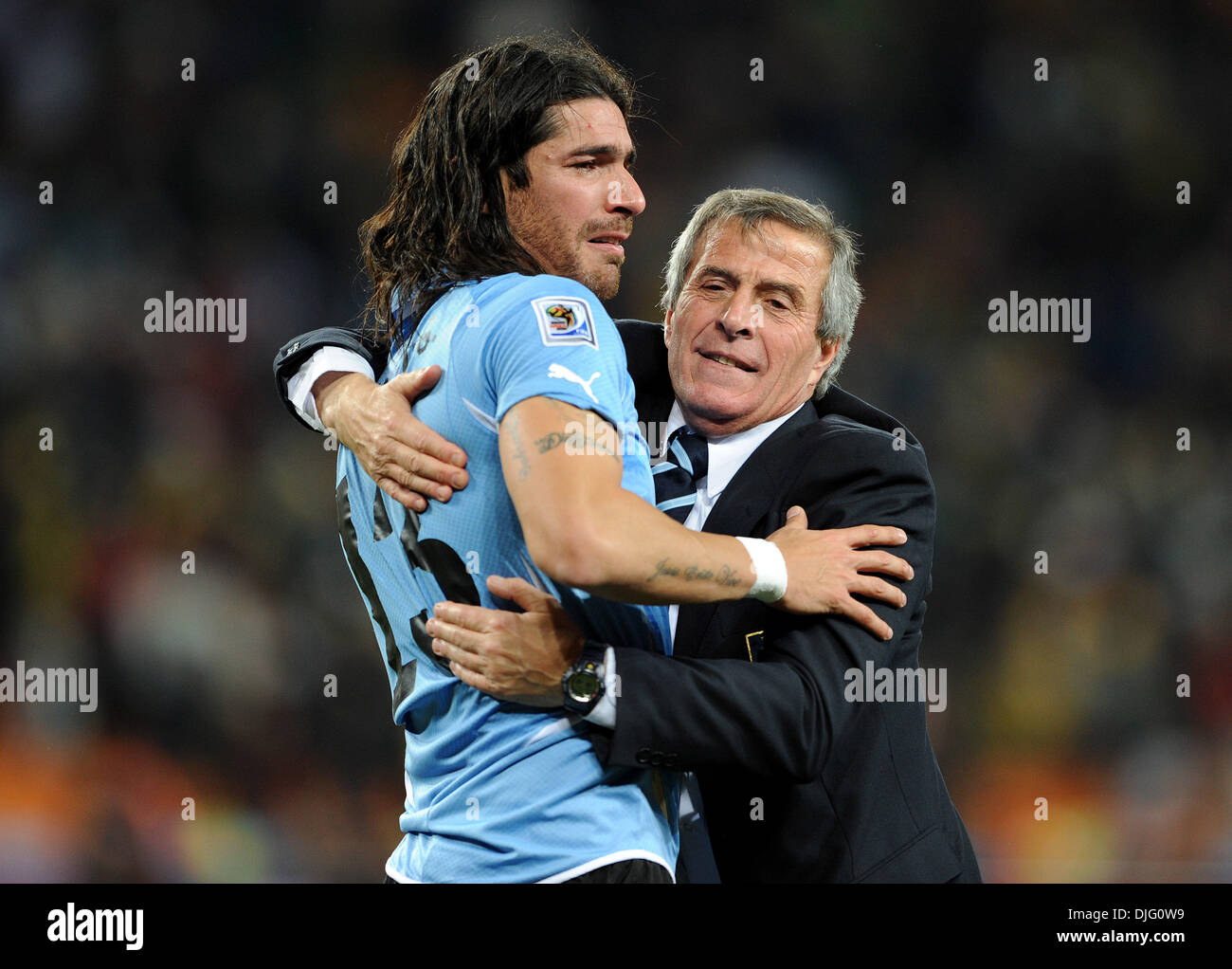 July 02, 2010 - Johannesburg, South Africa - Sebastian Abreu of Uruguay celebrates the victory with Oscar Tabarez, coach of Uruguay during the 2010 FIFA World Cup Quarter Final soccer match between Uruguay and Ghana at Soccer City Stadium on June 02, 2010 in Johannesburg, South Africa. (Credit Image: © Luca Ghidoni/ZUMApress.com) Stock Photo