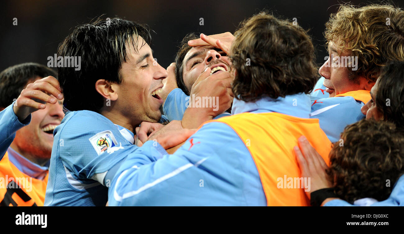 July 02, 2010 - Johannesburg, South Africa - Sebastian Abreu of Uruguay celebrates scoring the winning penalty with team mates during the 2010 FIFA World Cup Quarter Final soccer match between Uruguay and Ghana at Soccer City Stadium on June 02, 2010 in Johannesburg, South Africa. (Credit Image: © Luca Ghidoni/ZUMApress.com) Stock Photo