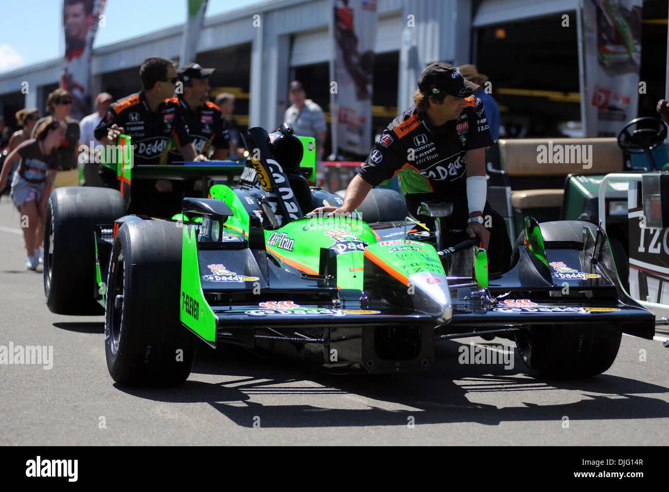The Go Daddy racing team pushes the Honda that Danica Patrick will ...