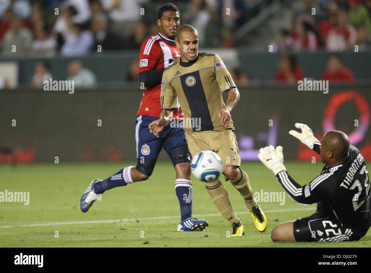 3 July 2010: Philadelphia Union M #7 Fred (MID) gets past Chivas USA D #12 Dario Delgado (L) but gets his shot blocked by Chivas USA GK #22 Zach Thornton (R) during the Chivas USA vs Philadelphia Union game at the Home Depot Center in Carson, California. Chivas went on to tie the Union with a final score of 1-1. Mandatory Credit: Brandon Parry / Southcreek Global (Credit Image: © B Stock Photo