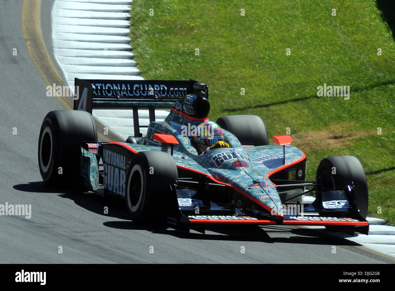 British driver Dan Wheldon pilots the National Guard Honda into the