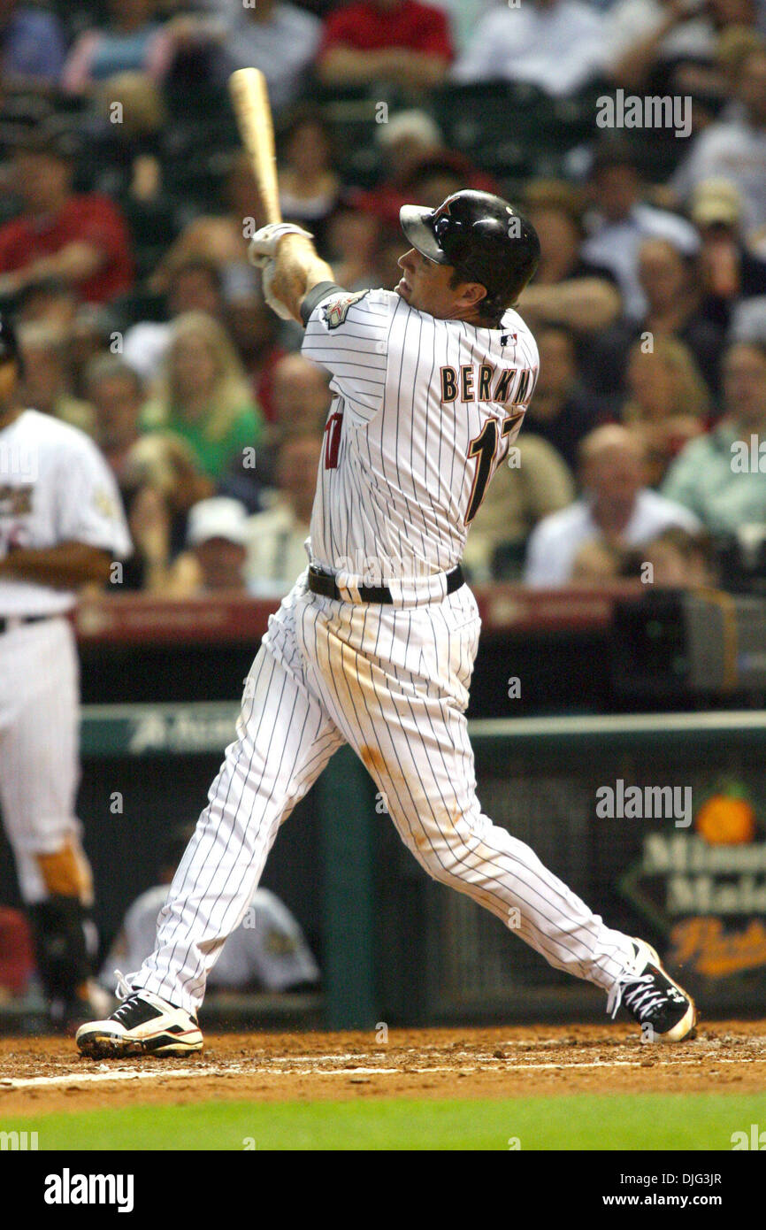 Houston Astros first baseman Lance Berkman (17) follows through on this  home run swing in the 5th inning. The Houston Astros defeated the  Pittsburgh Pirates 6 - 3 at Minute Maid Park
