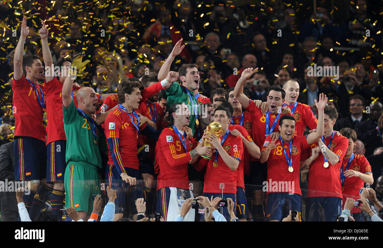 July 11, 2010 - Johannesburg, South Africa - Spain team members celebrate with the World Cup trophy after the 2010 FIFA World Cup Final soccer match between Netherlands and Spain at Soccer City Stadium on July 11, 2010 in Johannesburg, South Africa. (Credit Image: © Luca Ghidoni/ZUMApress.com) Stock Photo
