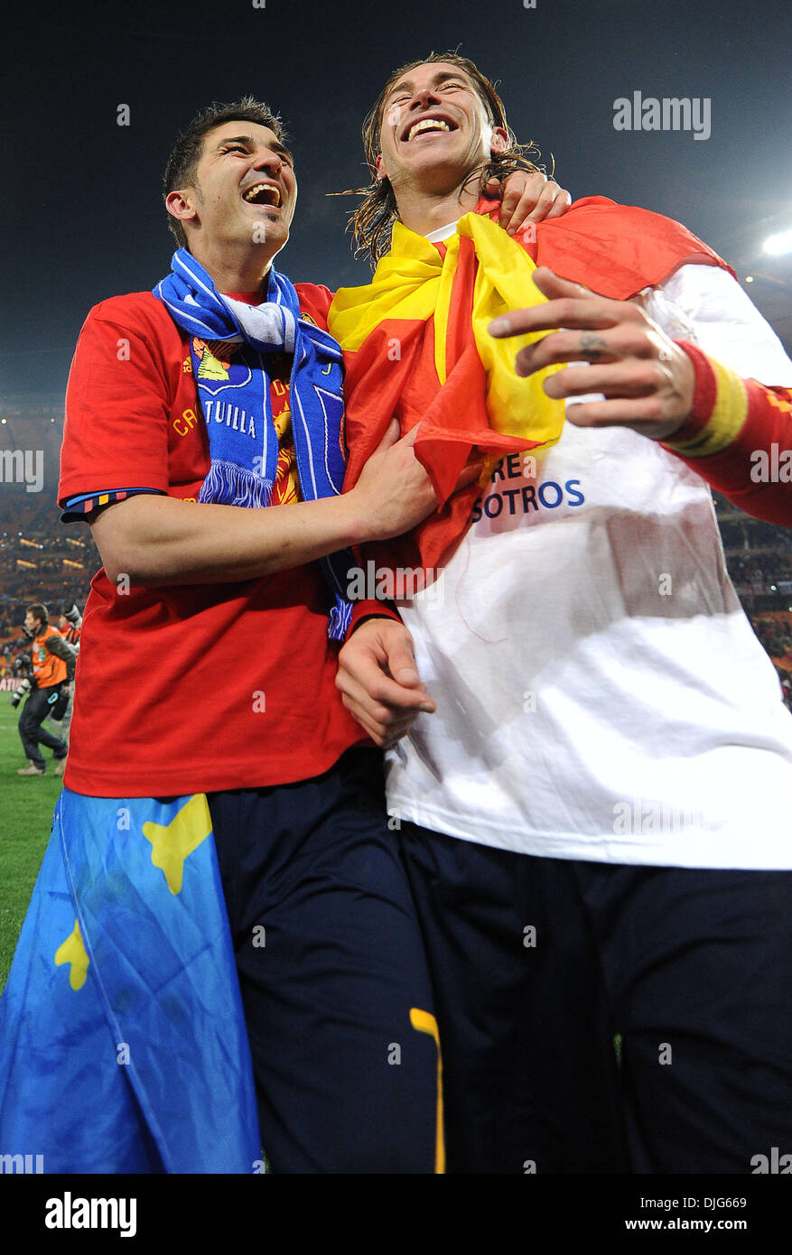 July 11, 2010 - Johannesburg, South Africa - David Villa and Sergio Ramos of Spain celebrate after the 2010 FIFA World Cup Final soccer match between Netherlands and Spain at Soccer City Stadium on July 11, 2010 in Johannesburg, South Africa. (Credit Image: © Luca Ghidoni/ZUMApress.com) Stock Photo
