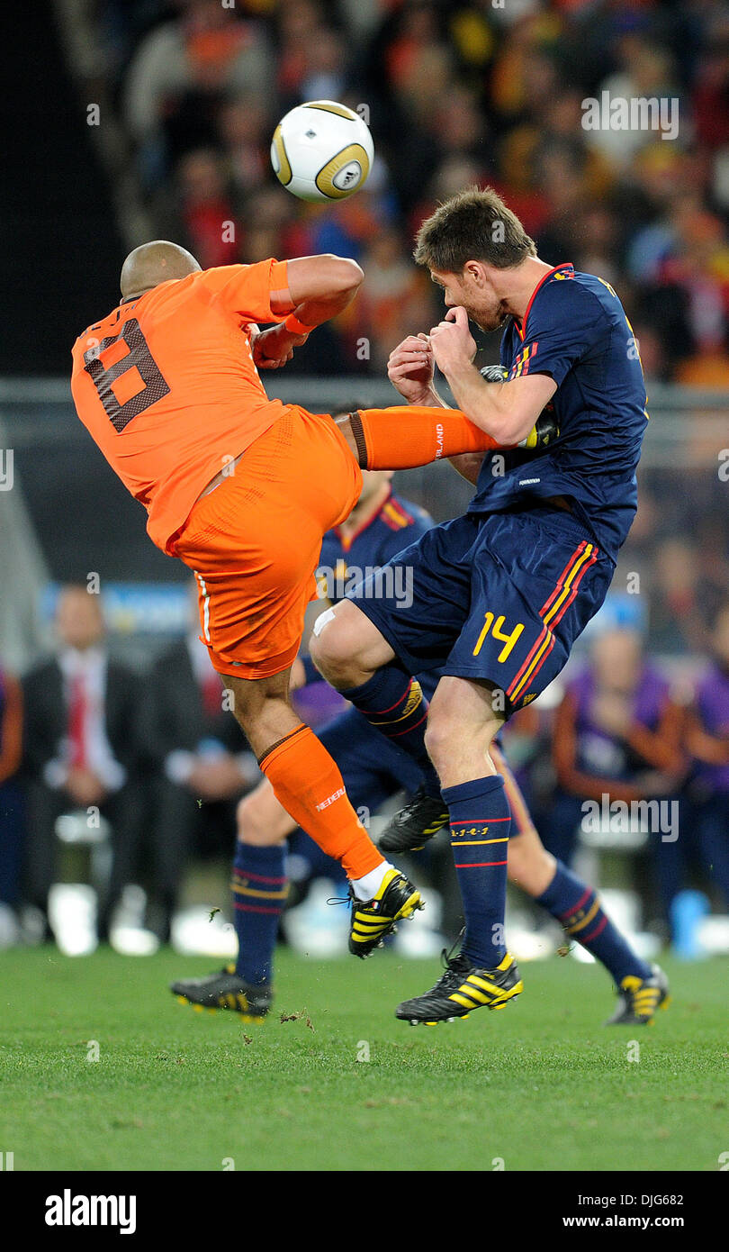July 11, 2010 - Johannesburg, South Africa - Nigel De Jong of Netherlands fights for the ball with Xabi Alonso of Spain during the 2010 FIFA World Cup Final soccer match between Netherlands and Spain at Soccer City Stadium on July 11, 2010 in Johannesburg, South Africa. (Credit Image: © Luca Ghidoni/ZUMApress.com) Stock Photo