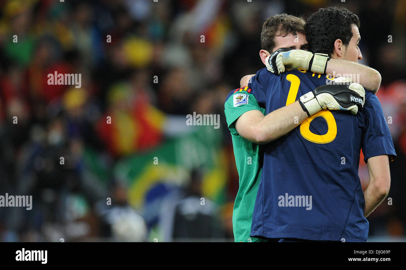July 11, 2010 - Johannesburg, South Africa - Iker Casillas of Spain celebrates a goal with Sergio Busquets during the 2010 FIFA World Cup Final soccer match between Netherlands and Spain at Soccer City Stadium on July 11, 2010 in Johannesburg, South Africa. (Credit Image: © Luca Ghidoni/ZUMApress.com) Stock Photo