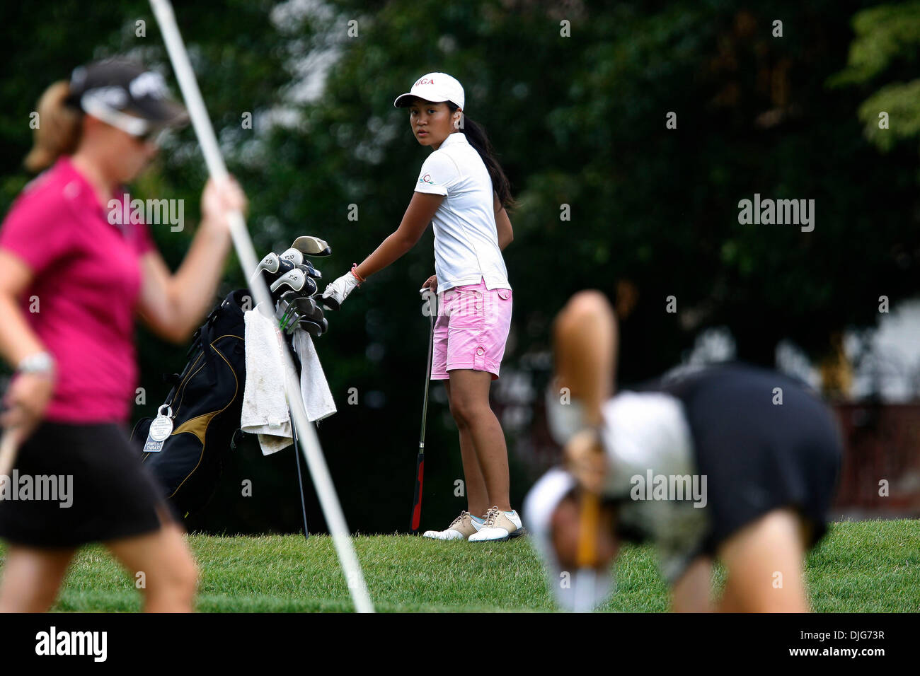 Jul 13, 2010 - Granger, Indiana, U.S. - PIMPLOY THIRATI, of Pathumtani, Thailand, prepares to putt Tuesday during the Women's Western Golf Association 84th National Junior Championship at Knollwood Country Club in Granger, Indiana. Thirati finished the two day qualifying round with a score of 155 and advanced to the championship flight starting Wednesday. The final round of match p Stock Photo