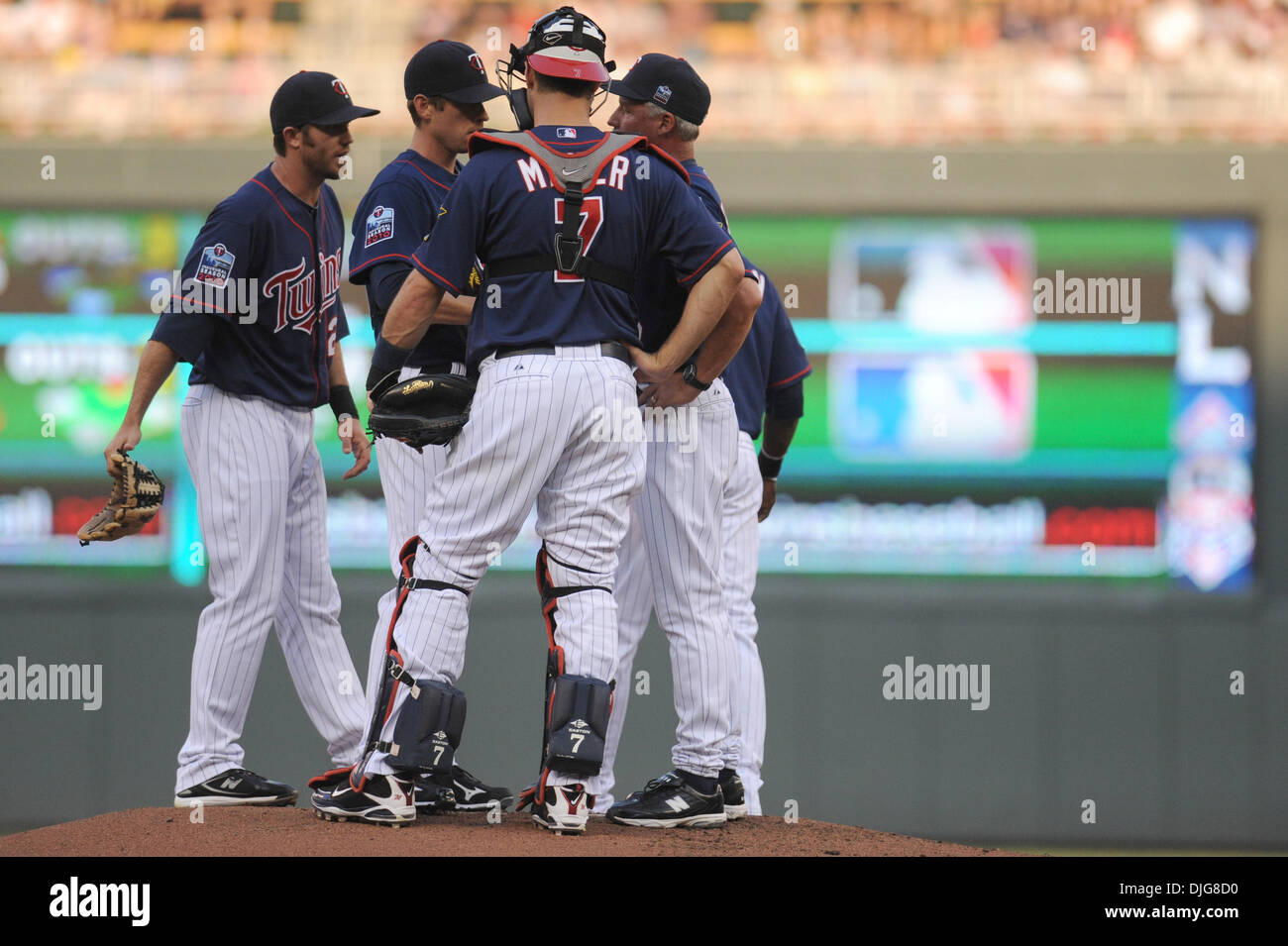 Minnesota Twins starting pitcher Kevin Slowey #59 (L), shortstop J.J ...