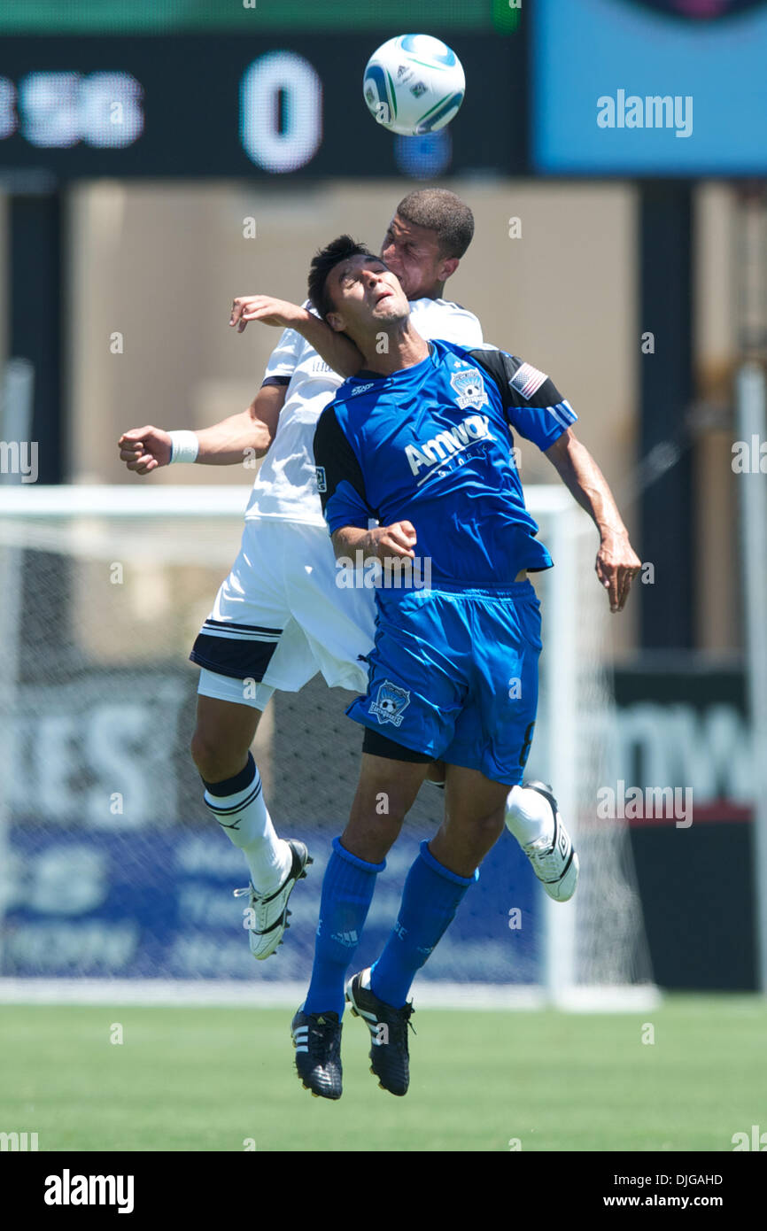 July 17, 2010 - Santa Clara, California, United States of America - 17 July 2010: Tottenham Hotspur D Kyle Walker (28) and San Jose Earthquakes F Chris Wondolowski (8) battle for a header during the exhibition match between the San Jose Earthquakes and Tottenham Hotspur at Buck Shaw Stadium in Santa Clara, CA..Mandatory Credit: Matt Cohen / Southcreek Global (Credit Image: © Southc Stock Photo