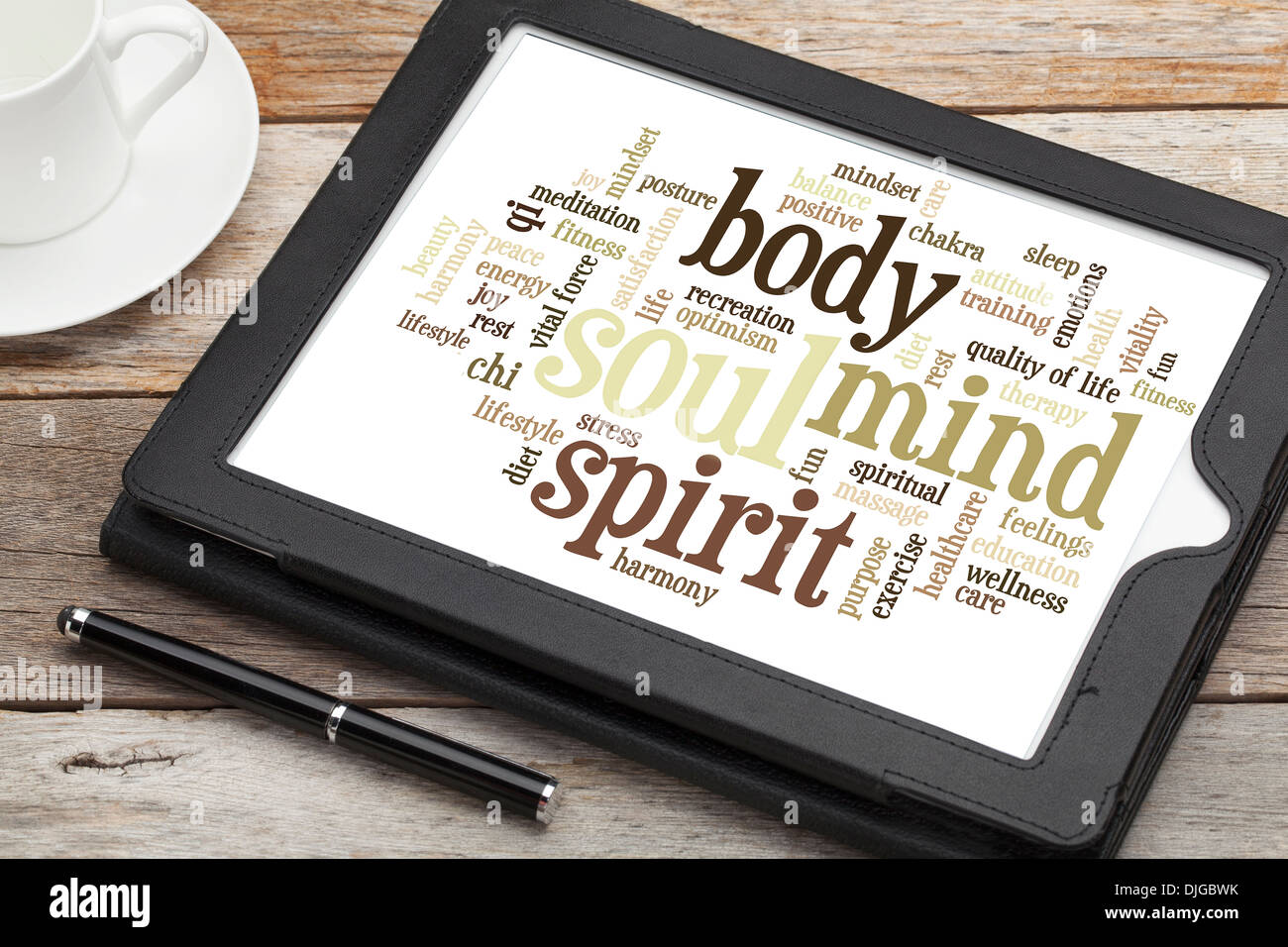 mind, body, spirit and soul - word cloud on a digital tablet Stock Photo
