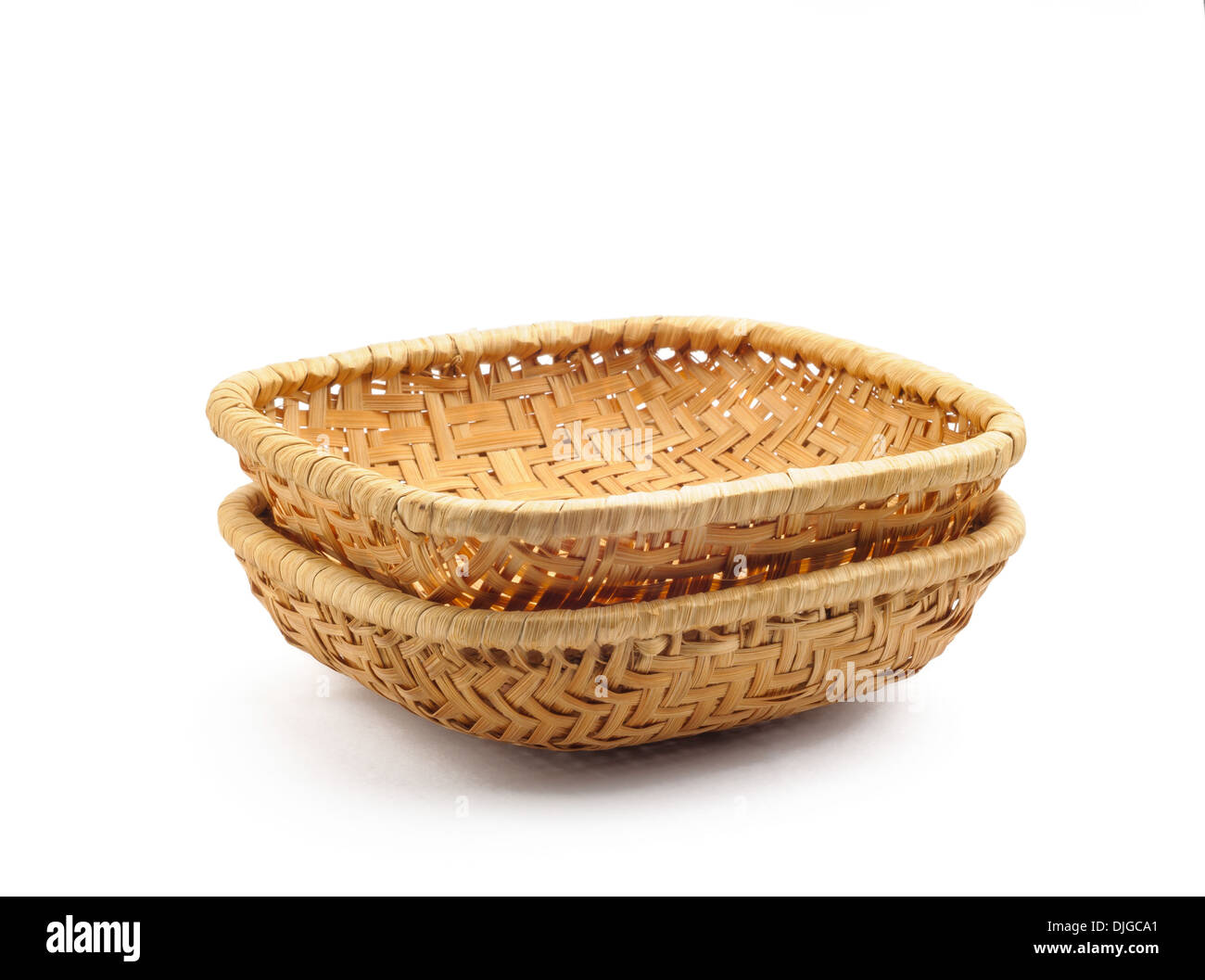 Two little wicker baskets isolated on white background Stock Photo