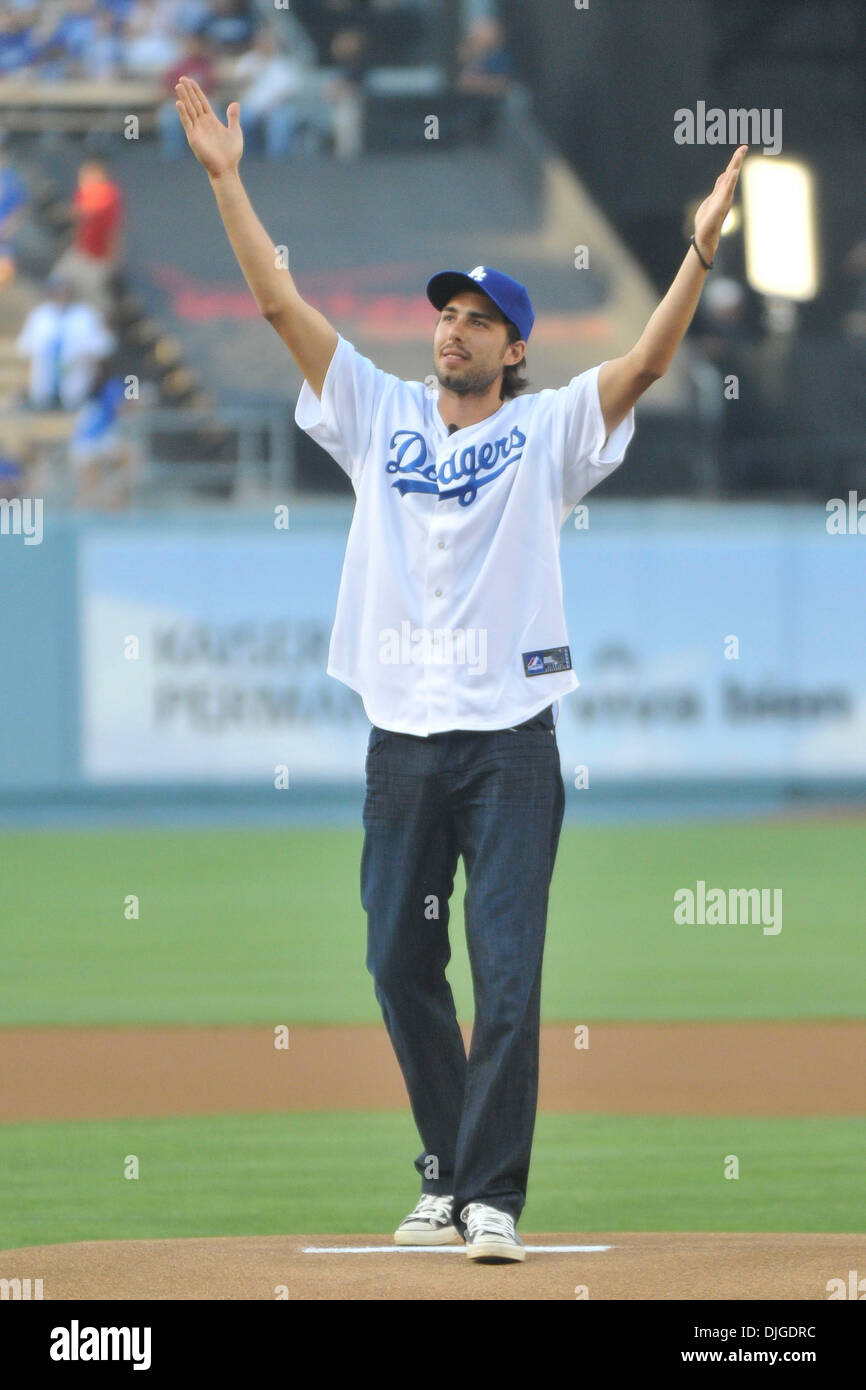July 19, 2010 - Los Angeles, California, United States of America - 19 July 2010: Los Angeles Lakers forward Sasha Vujacic after throwing out the ceremonial first pitch gestures to the crowd. The San Francisco Giants lost to the Los Angeles Dodgers at Dodger Stadium in Los Angeles, California. Mandatory Credit: Andrew Fielding / Southcreek Global (Credit Image: © Southcreek Global/ Stock Photo
