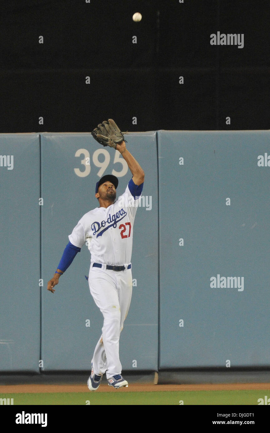 July 19, 2010 - Los Angeles, California, United States of America - 19 July 2010: Los Angeles Dodgers center fielder Matt Kemp (27) backs up to the wall to make a catch. The San Francisco Giants lost to the Los Angeles Dodgers at Dodger Stadium in Los Angeles, California. Mandatory Credit: Andrew Fielding / Southcreek Global (Credit Image: © Southcreek Global/ZUMApress.com) Stock Photo