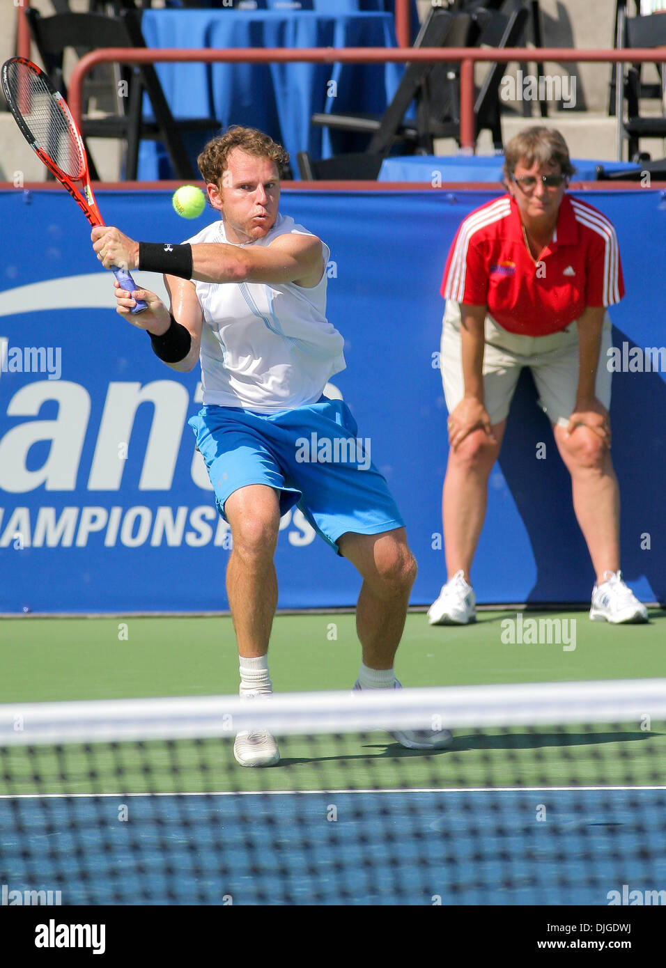 July 19, 2010 - Johns Creek, Georgia, United States of America - 19 July: Day 1 Atlanta Tennis Championships.  Michael Russell of the USA returns the ball to Benjamin Becker of Germany on Day 1 of The Atlanta Tennis Championships in Atlanta, Georgia. Mandatory Credit: Aaron Gilbert / Southcreek Global (Credit Image: © Southcreek Global/ZUMApress.com) Stock Photo